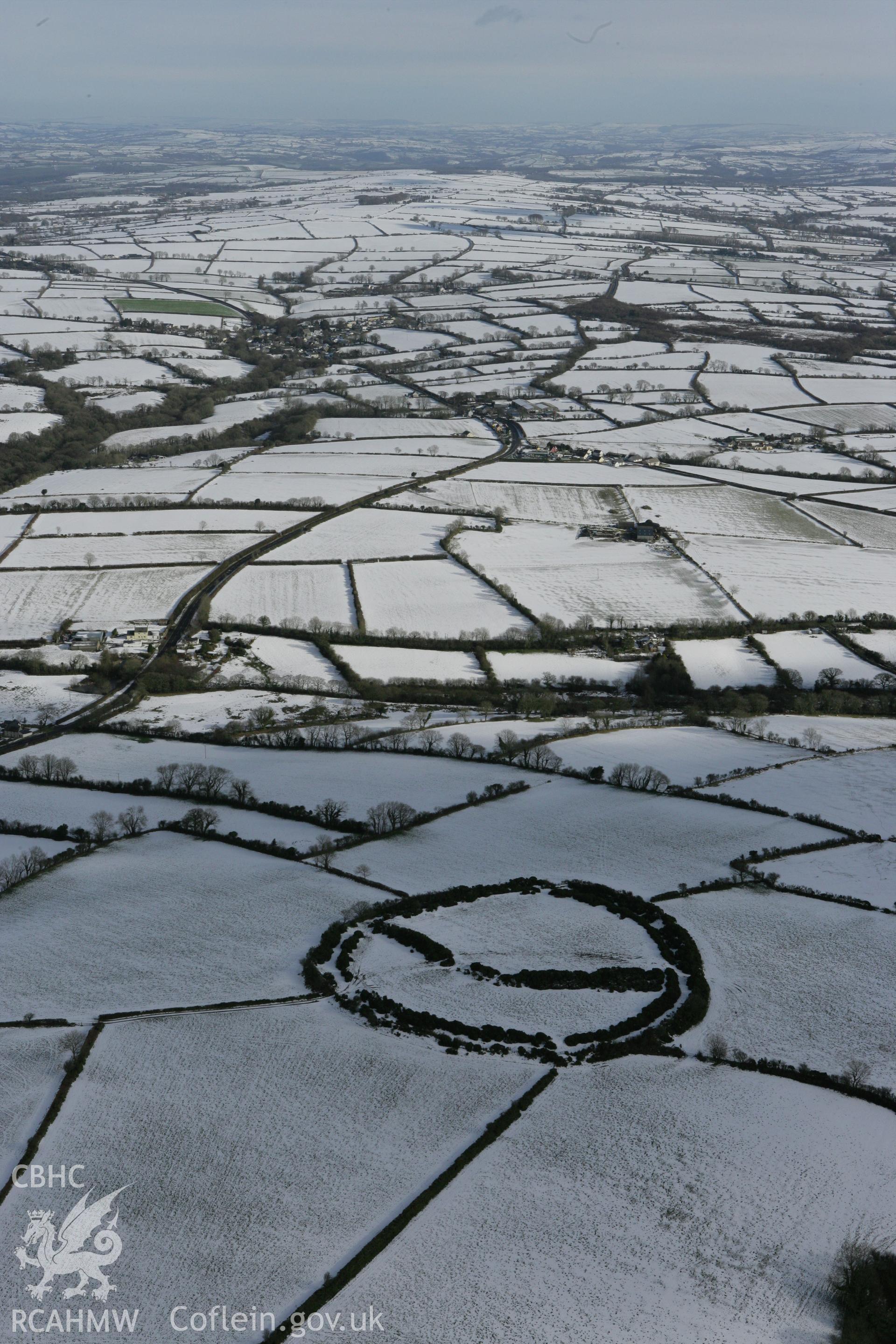 RCAHMW colour oblique photograph of Castell Mawr. Taken by Toby Driver on 06/02/2009.