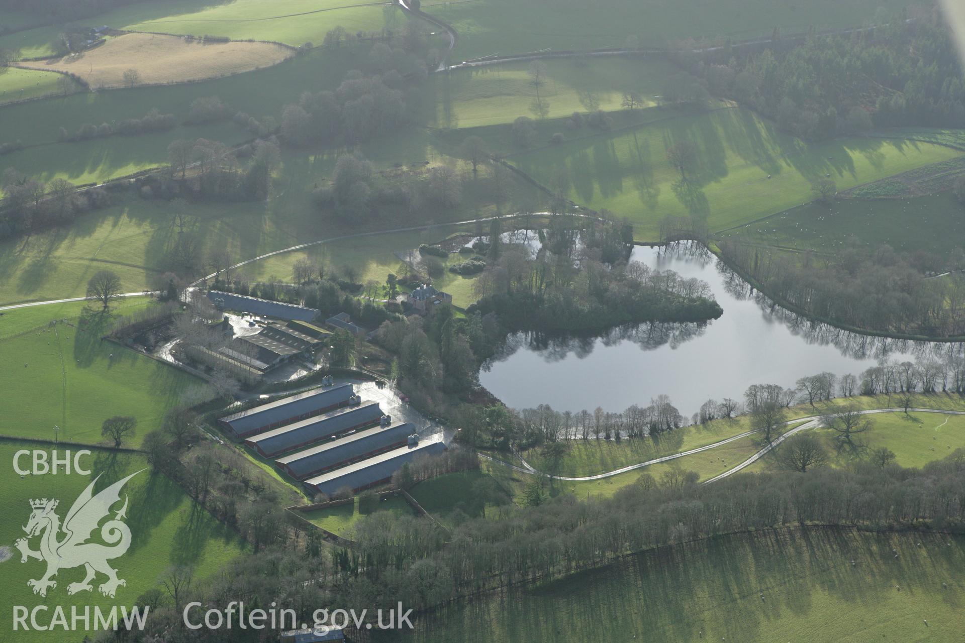 RCAHMW colour oblique aerial photograph of Maes Mawr Hall, Guilsfield. Taken on 10 December 2009 by Toby Driver