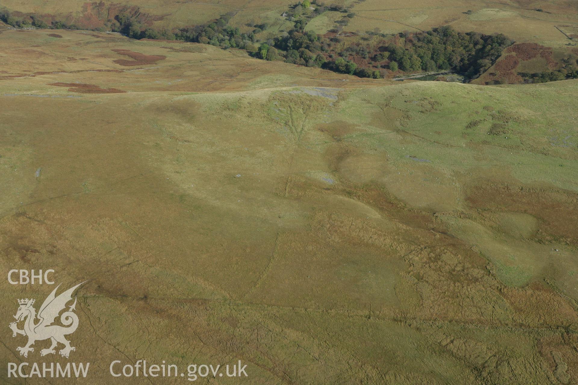 RCAHMW colour oblique aerial photograph of the Derlwyn Isaf cairnfield from the west. Taken on 14 October 2009 by Toby Driver