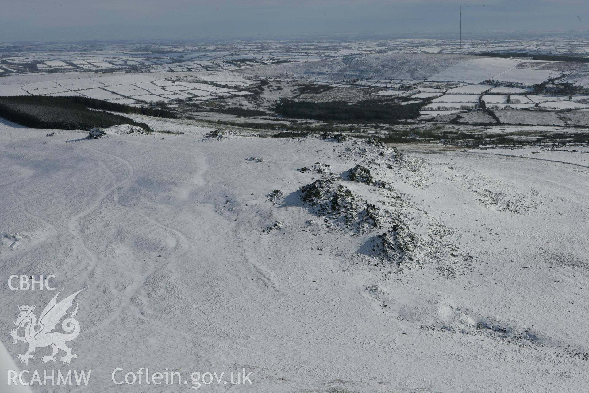 RCAHMW colour oblique photograph of Carn Menyn outcrops. Taken by Toby Driver on 06/02/2009.