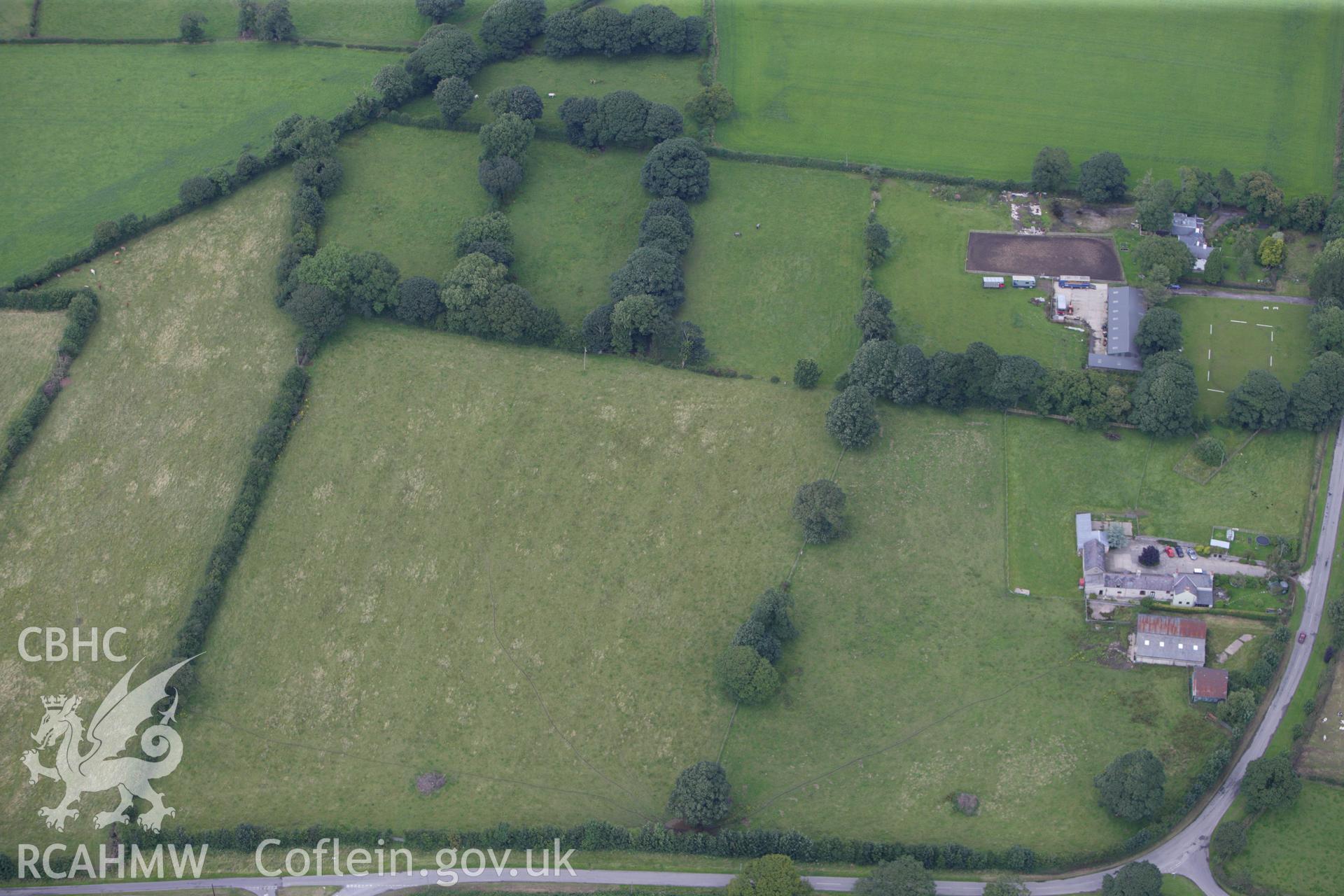 RCAHMW colour oblique aerial photograph of Y Groesfaen Round Barrow. Taken on 30 July 2009 by Toby Driver