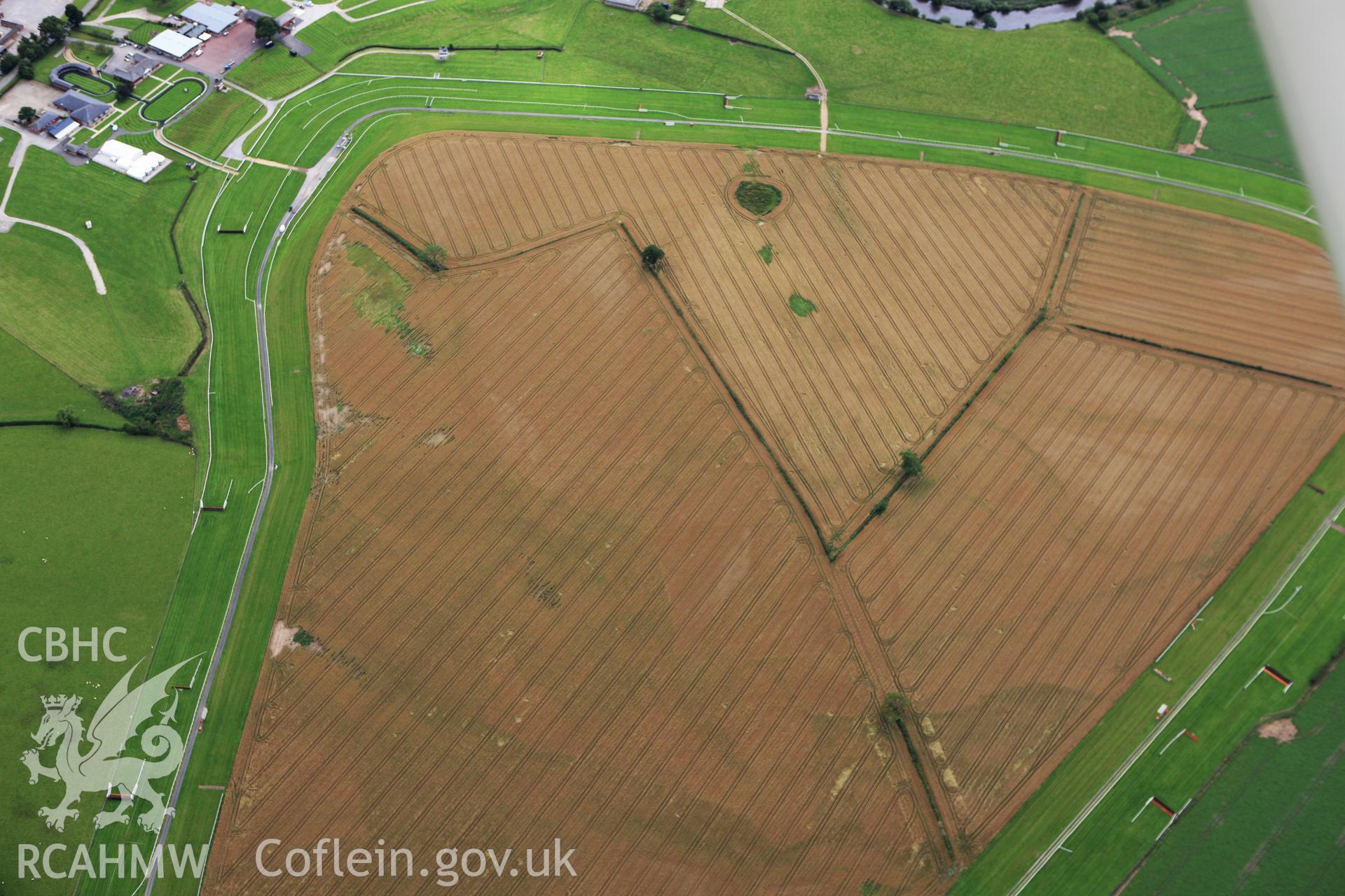 RCAHMW colour oblique aerial photograph of Bangor Race Course Enclosure. Taken on 30 July 2009 by Toby Driver