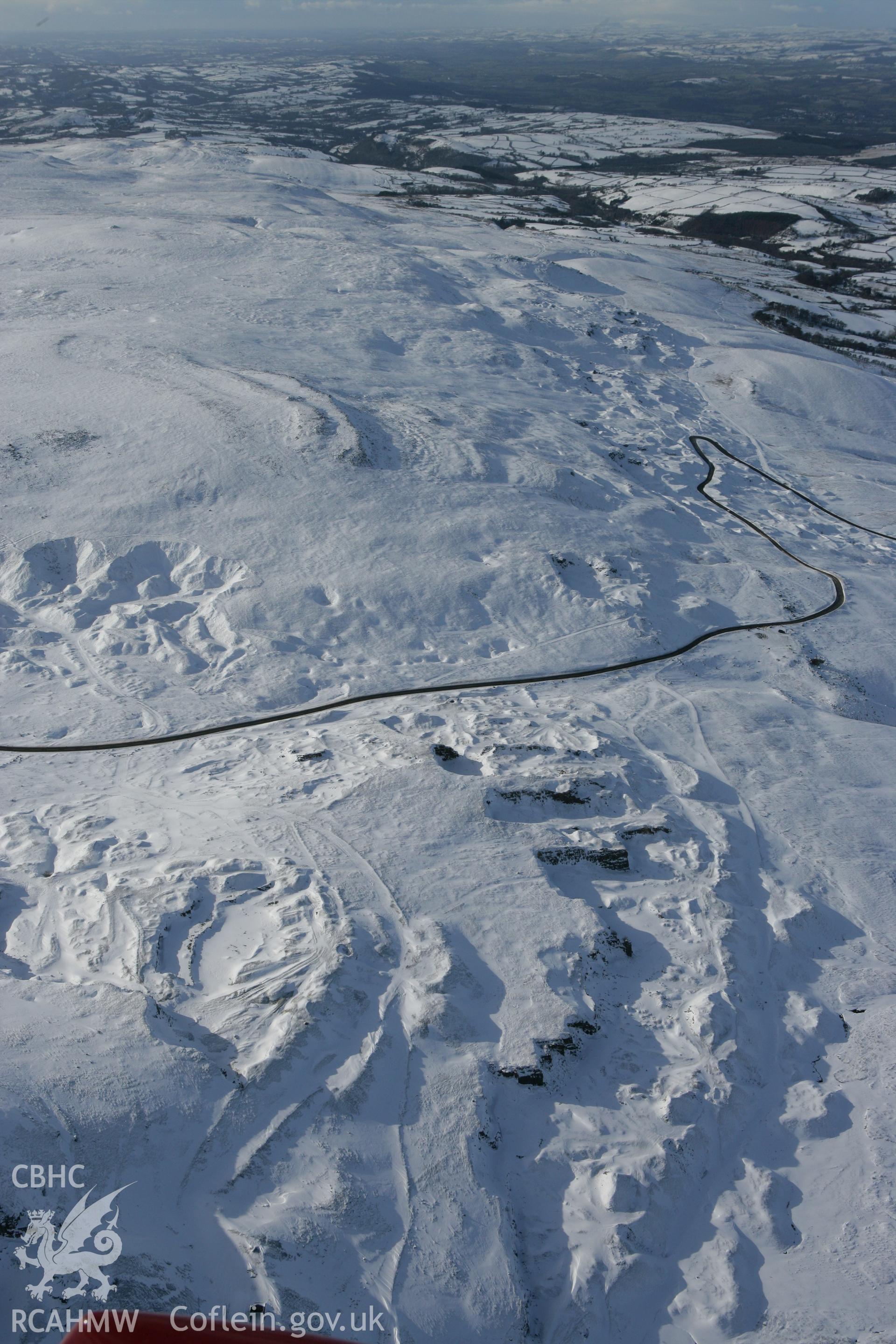 RCAHMW colour oblique photograph of Foel Fawr quarry complex, winter landscape. Taken by Toby Driver on 06/02/2009.