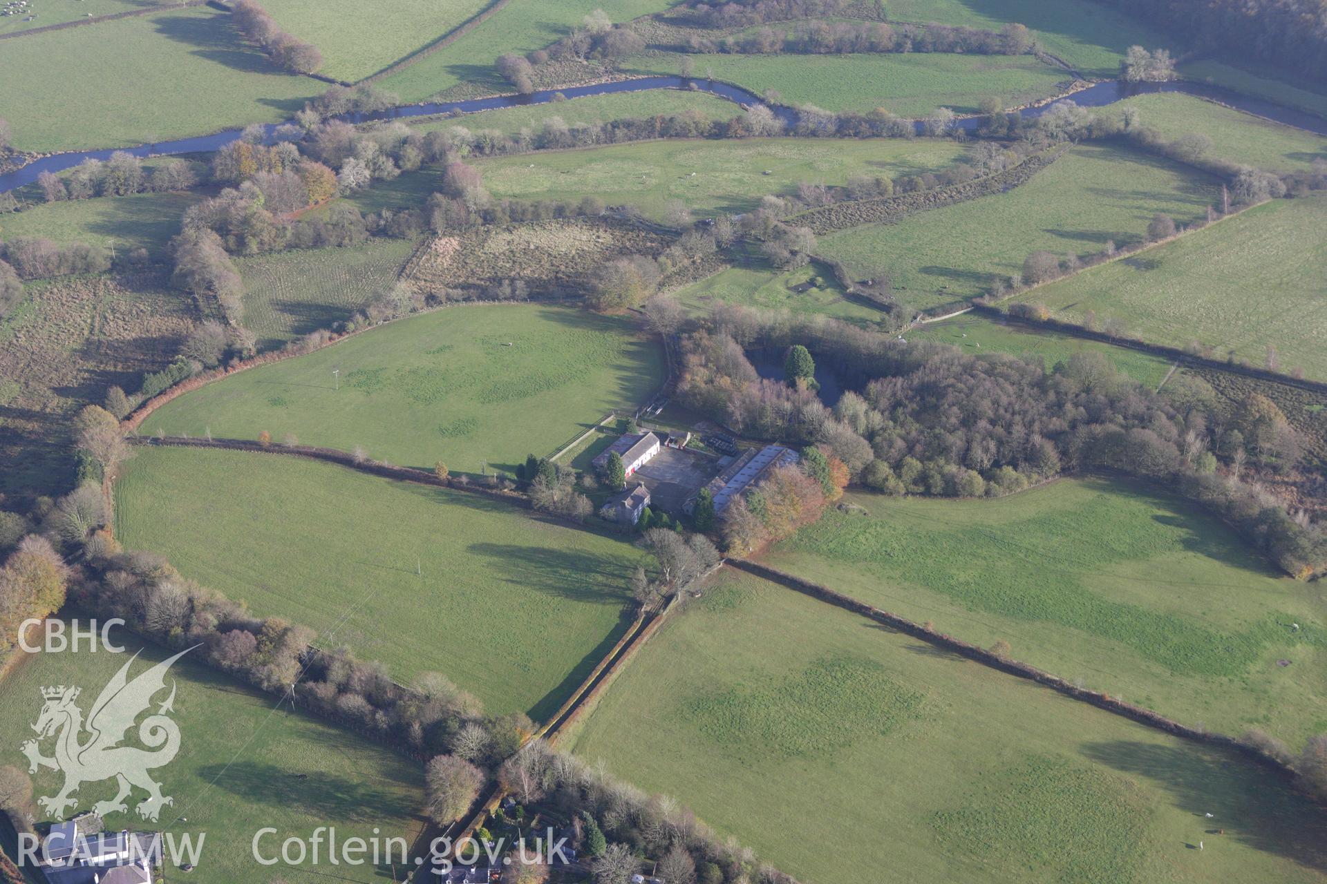 RCAHMW colour oblique aerial photograph of Llanio Roman Fort. Taken on 09 November 2009 by Toby Driver
