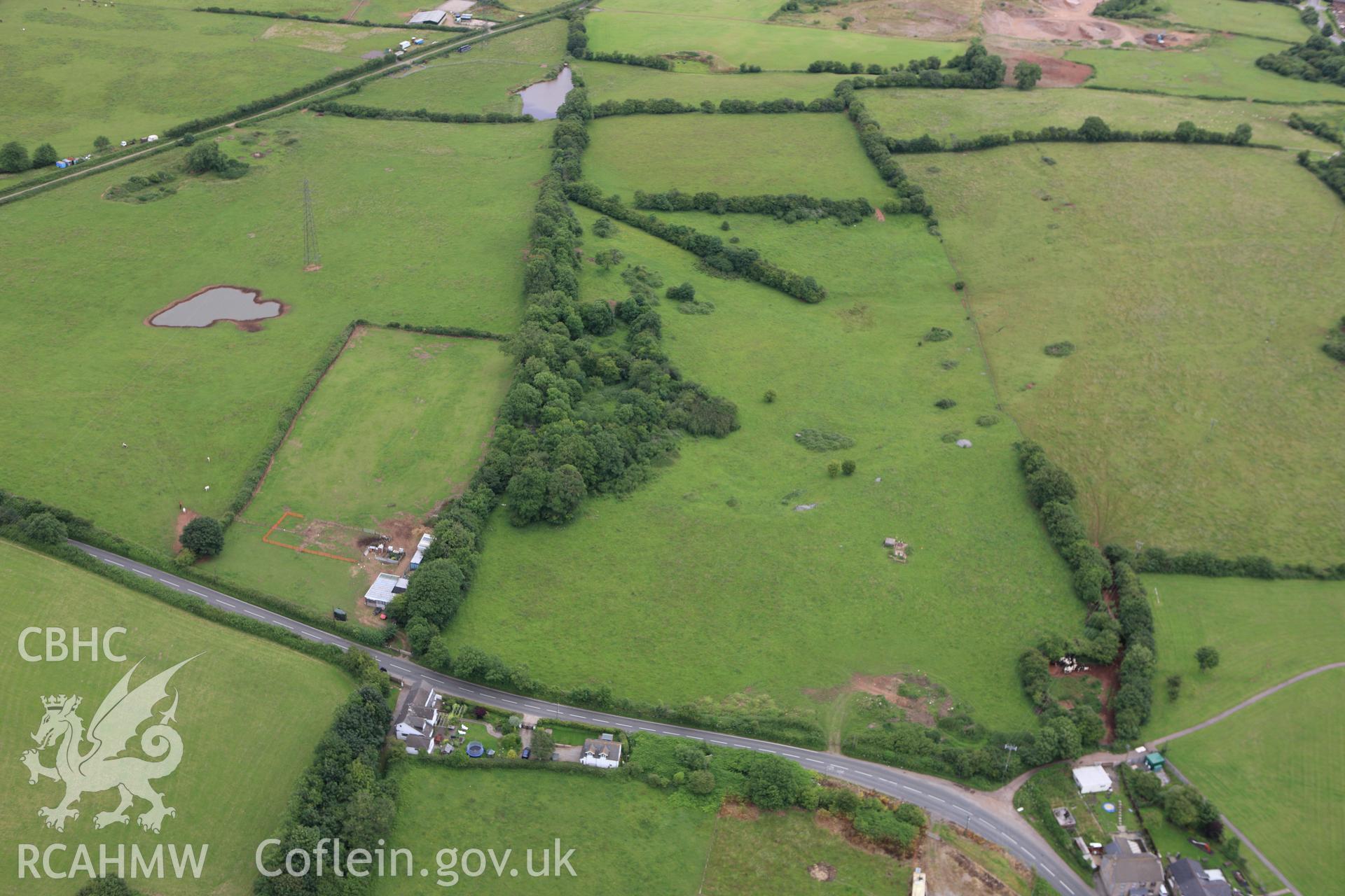 RCAHMW colour oblique aerial photograph of Naboth's Vineyard Barrow 'A'. Taken on 09 July 2009 by Toby Driver