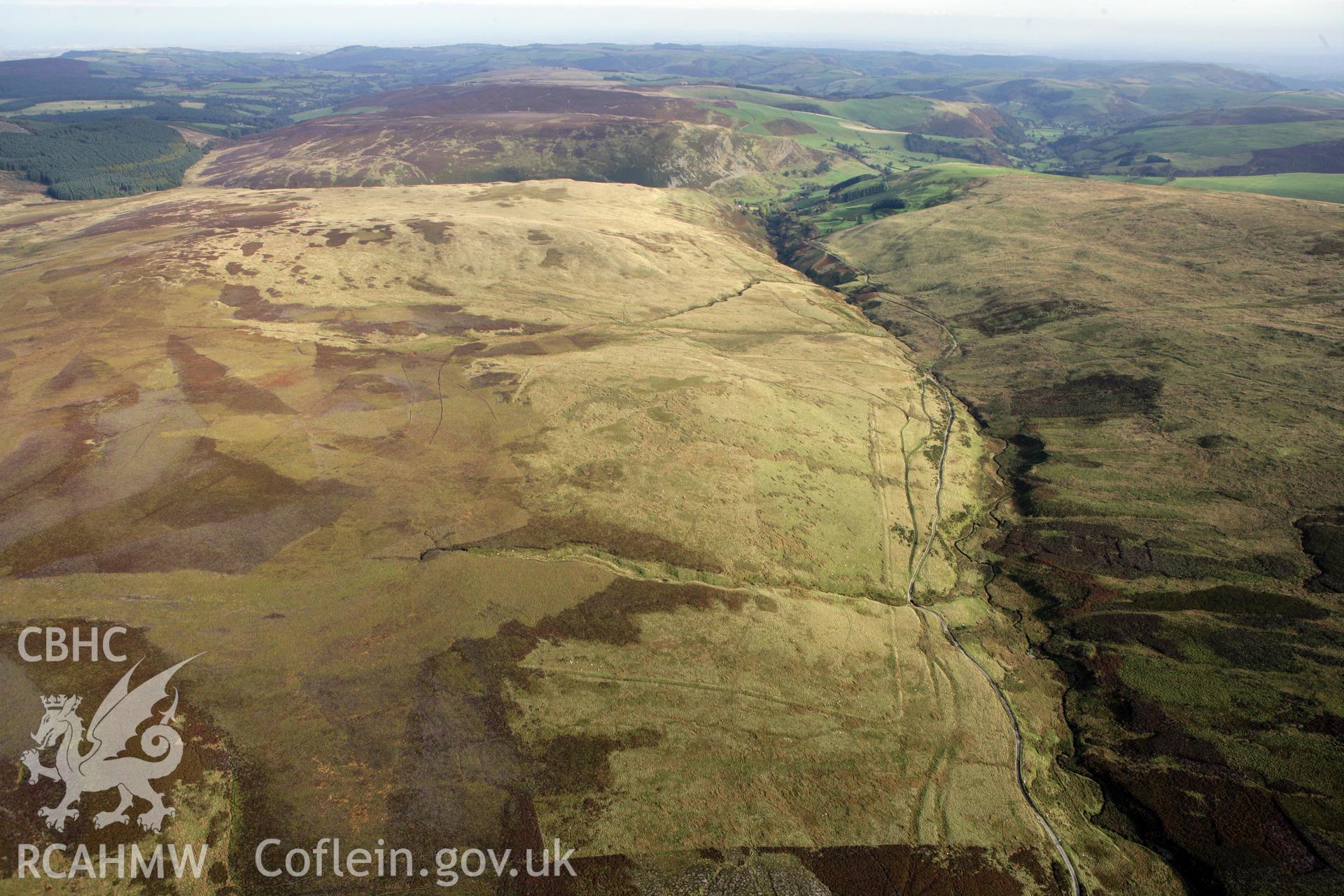 RCAHMW colour oblique aerial photograph of Pen Plaenau Roman Marching Camp. Taken on 13 October 2009 by Toby Driver