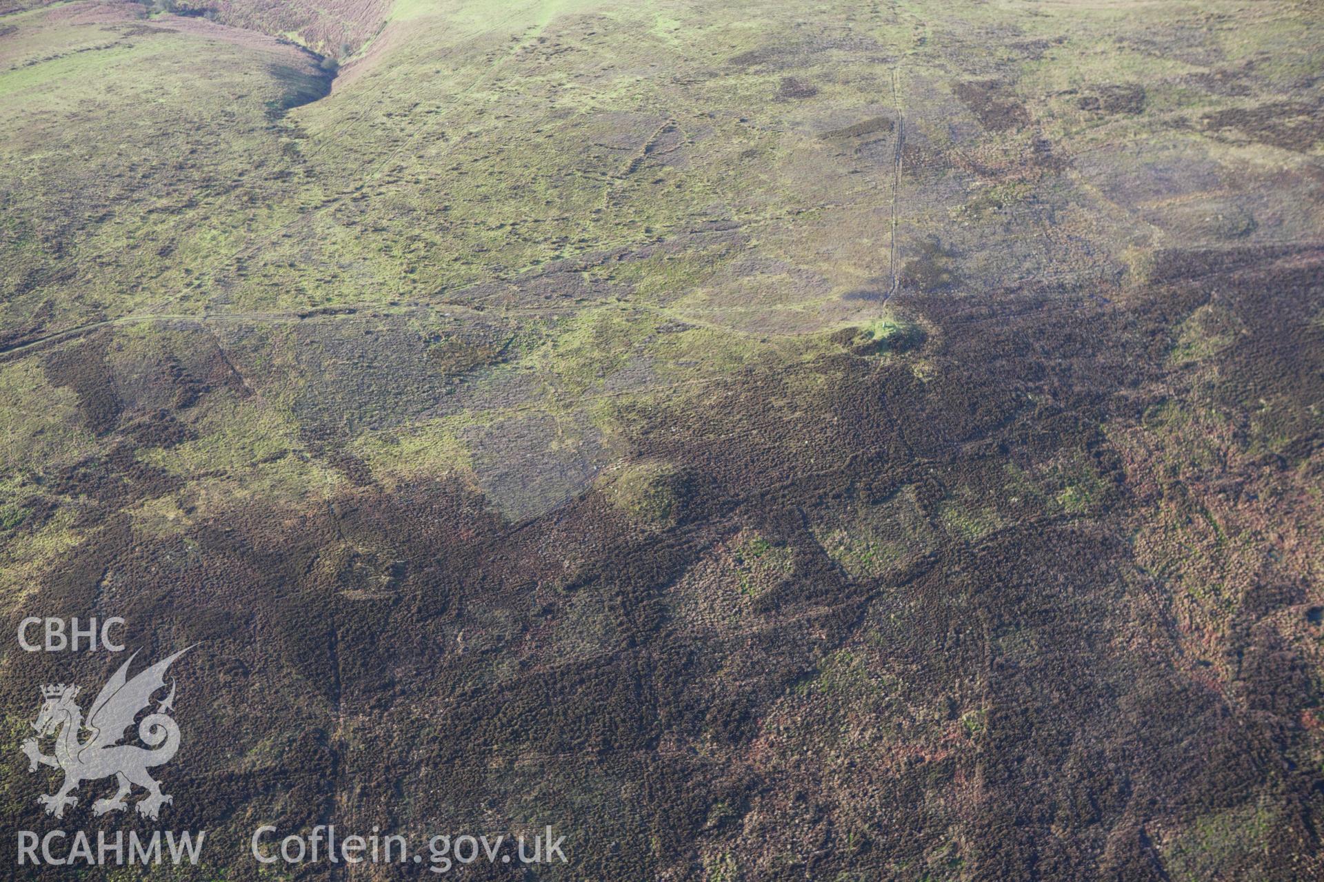 RCAHMW colour oblique aerial photograph of Beacon Hill Barrow II. Taken on 10 December 2009 by Toby Driver