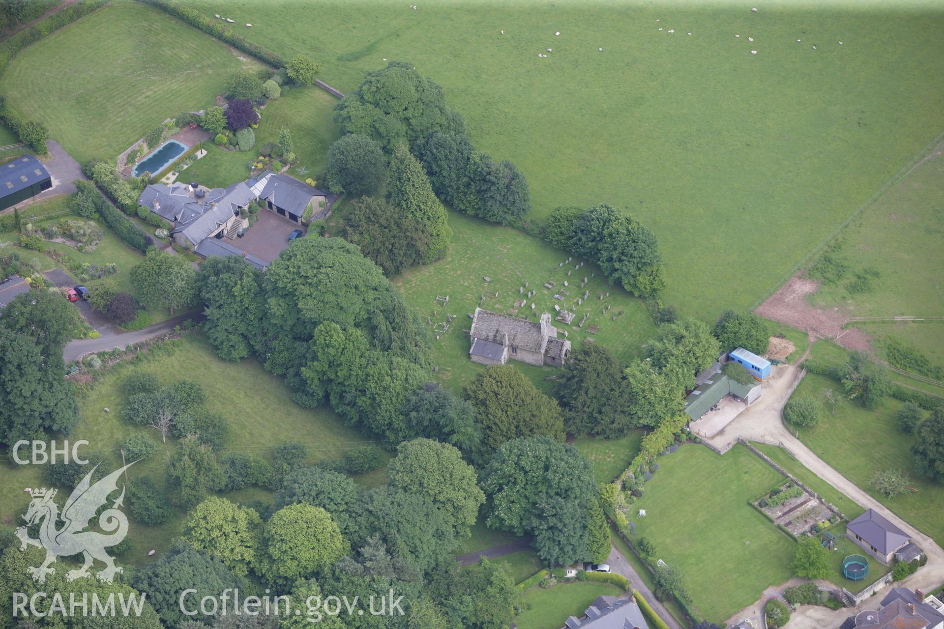 RCAHMW colour oblique aerial photograph of Bettws Newydd Churchyard Cross. Taken on 11 June 2009 by Toby Driver