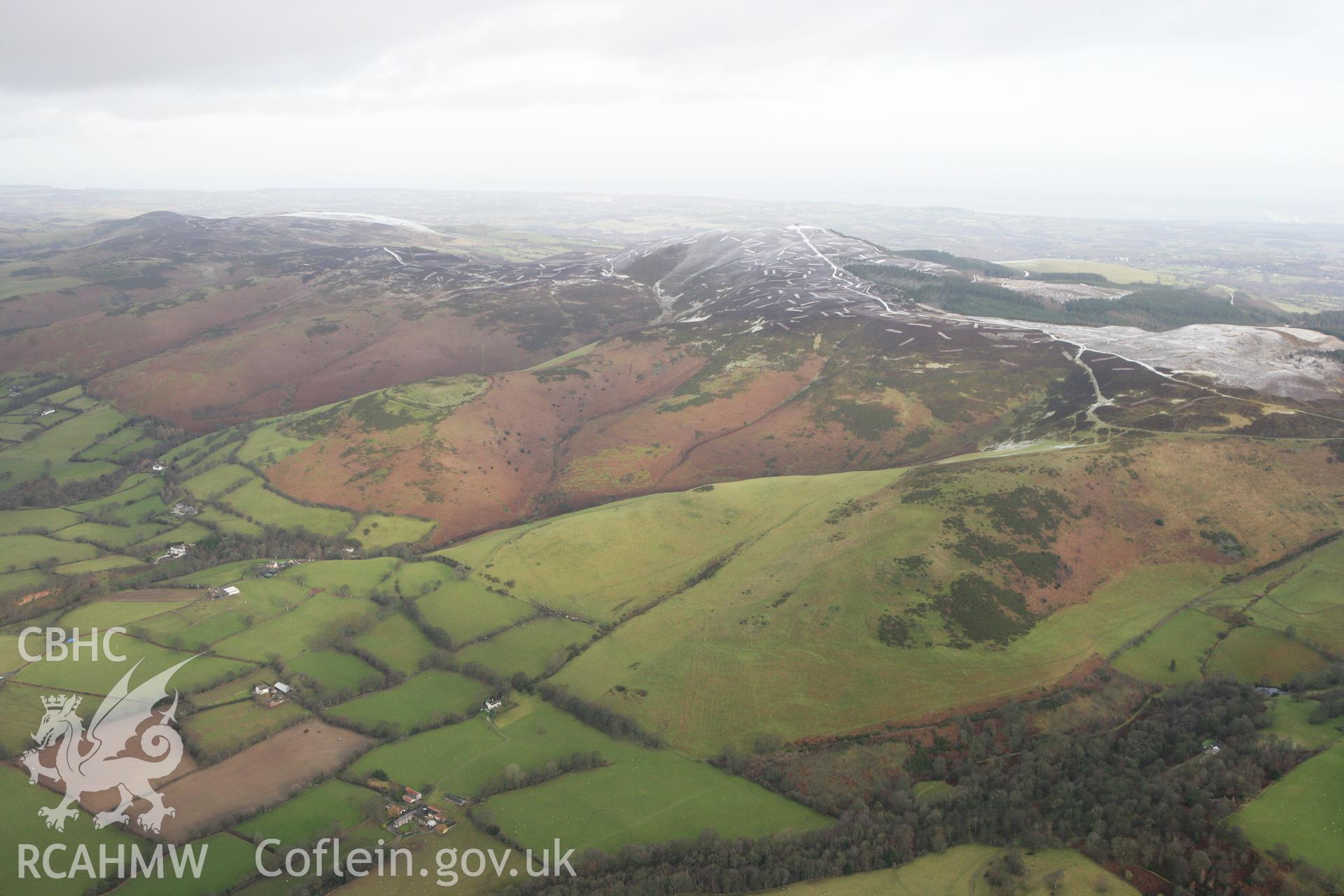RCAHMW colour oblique photograph of Moel-y-Gaer hillfort, distant winter landscape. Taken by Toby Driver on 21/01/2009.