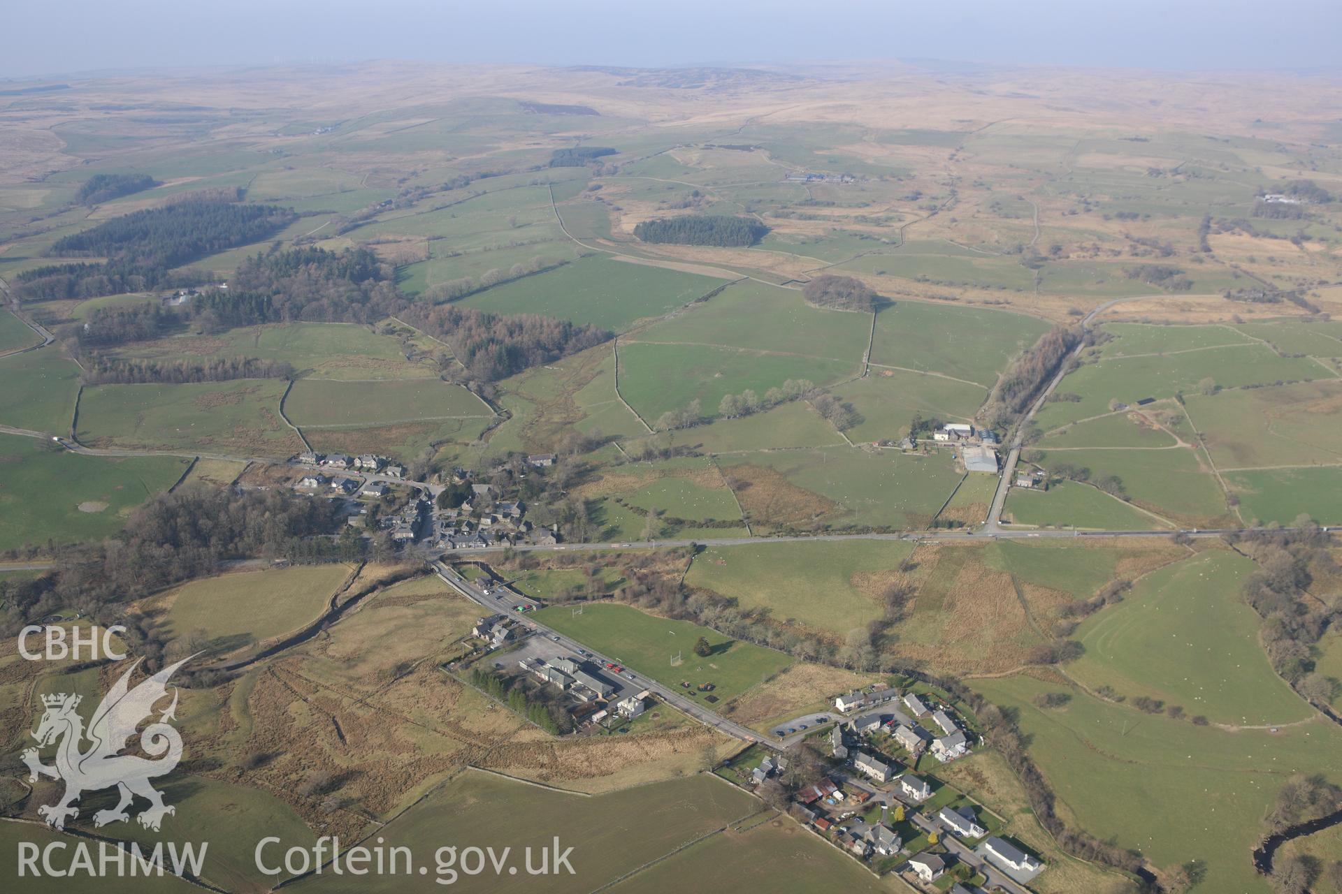 RCAHMW colour oblique photograph of Pentrefoelas, village, landscape view. Taken by Toby Driver on 18/03/2009.