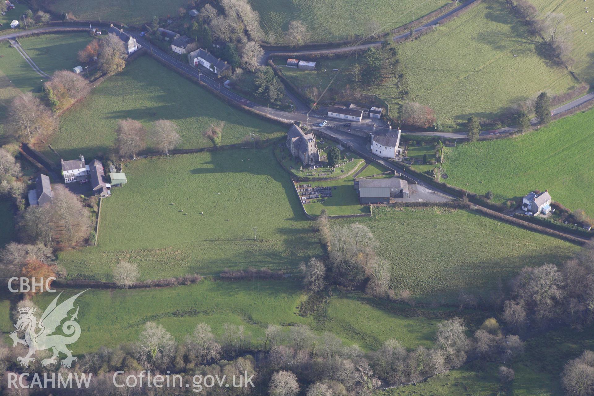 RCAHMW colour oblique aerial photograph of St Davids Church, Capel Dewi, with a circular churchyard. Taken on 09 November 2009 by Toby Driver