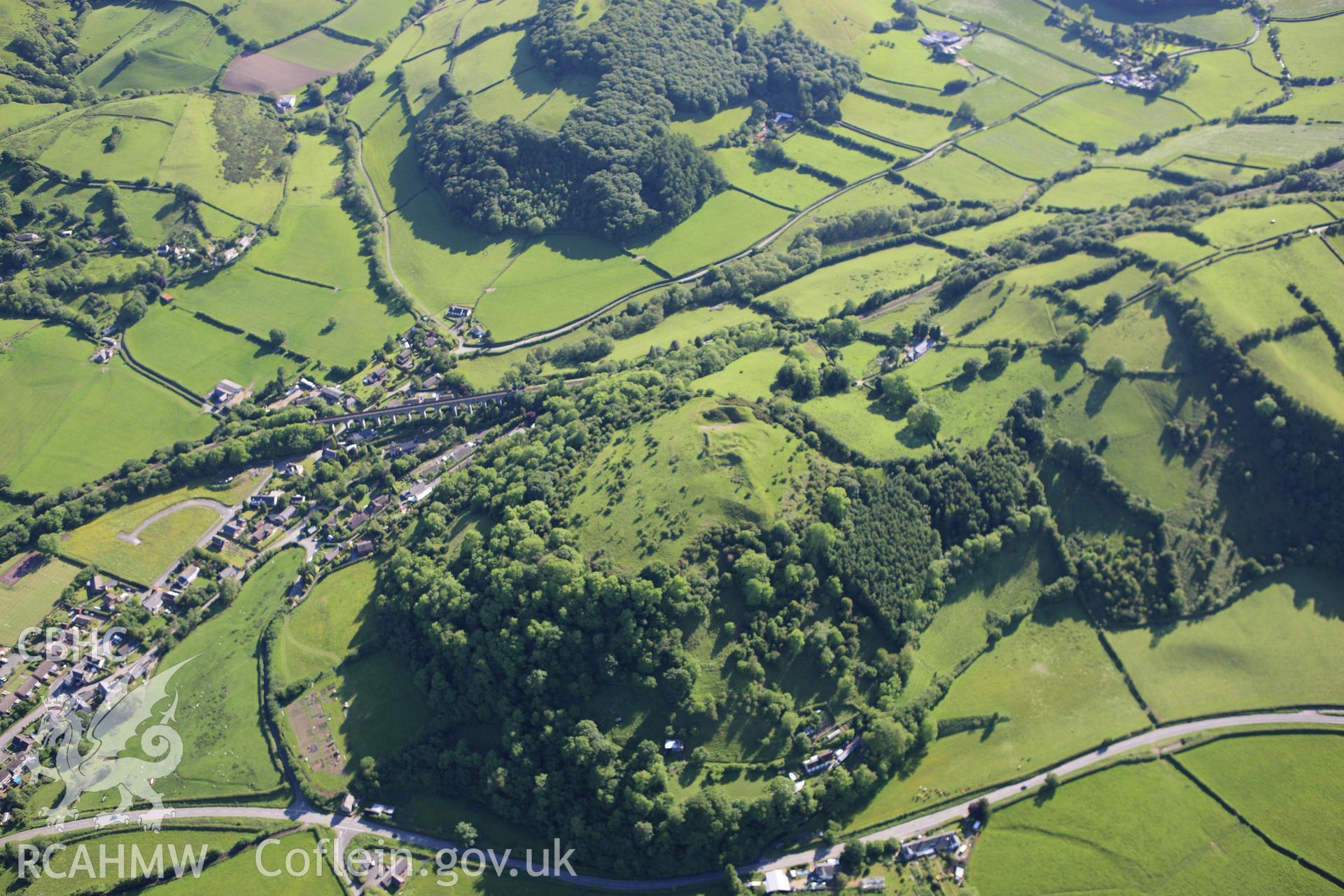 RCAHMW colour oblique aerial photograph of Cnwclas Castle. Taken on 11 June 2009 by Toby Driver