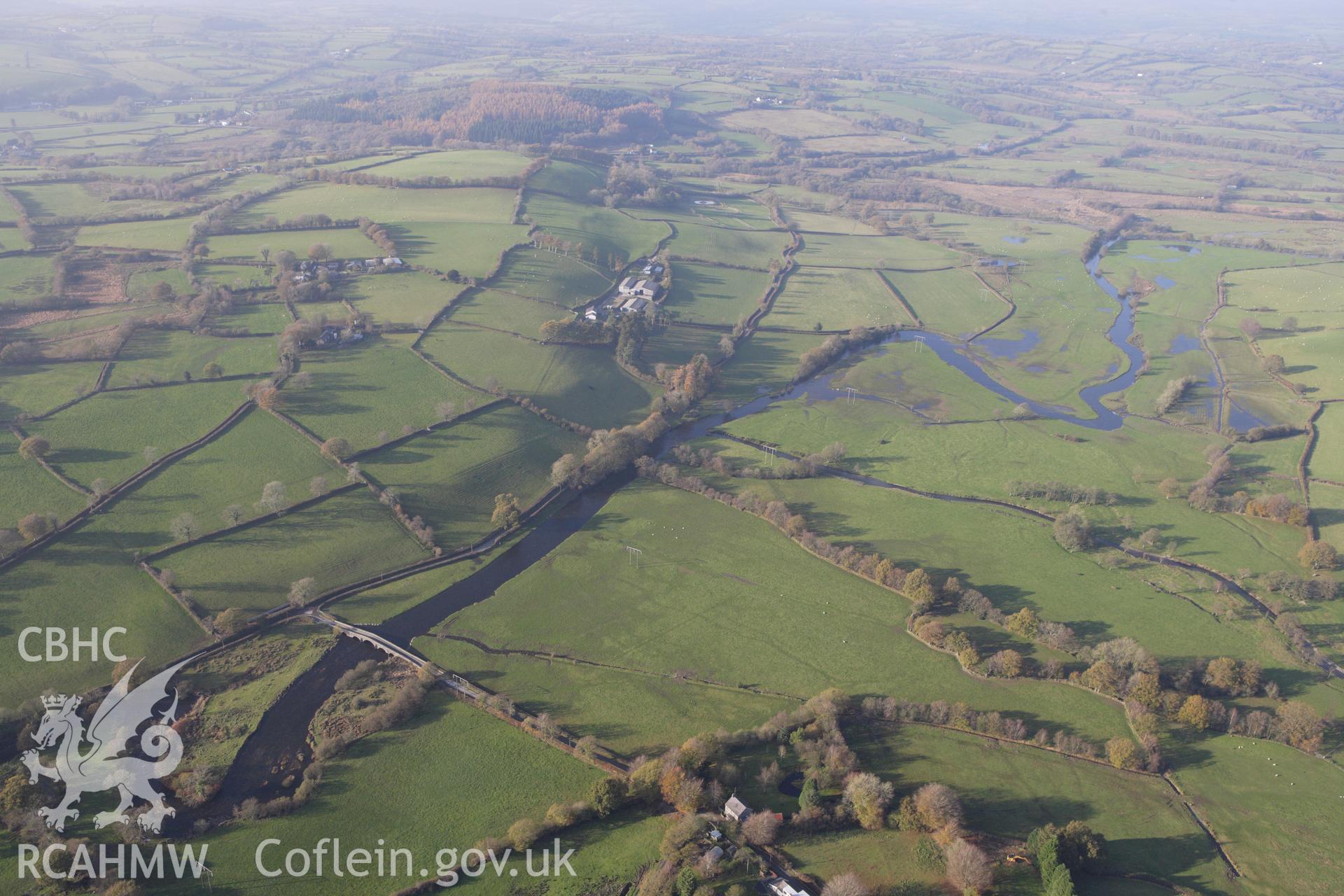 RCAHMW colour oblique aerial photograph of Pont Gogoyan. A landscape view. Taken on 09 November 2009 by Toby Driver