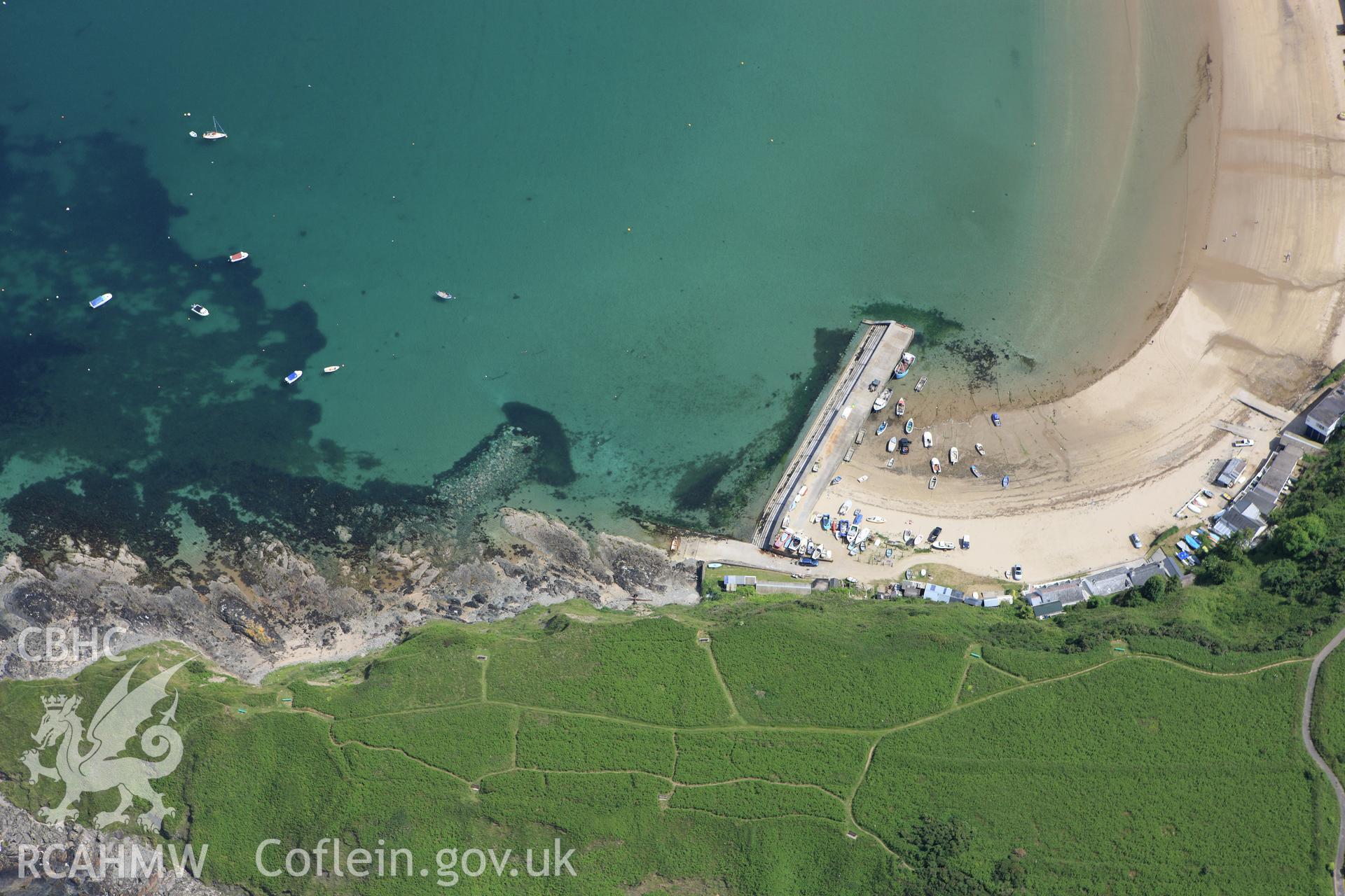 RCAHMW colour oblique aerial photograph of Penrhyn Nefyn Harbour and Old Jetty. Taken on 16 June 2009 by Toby Driver