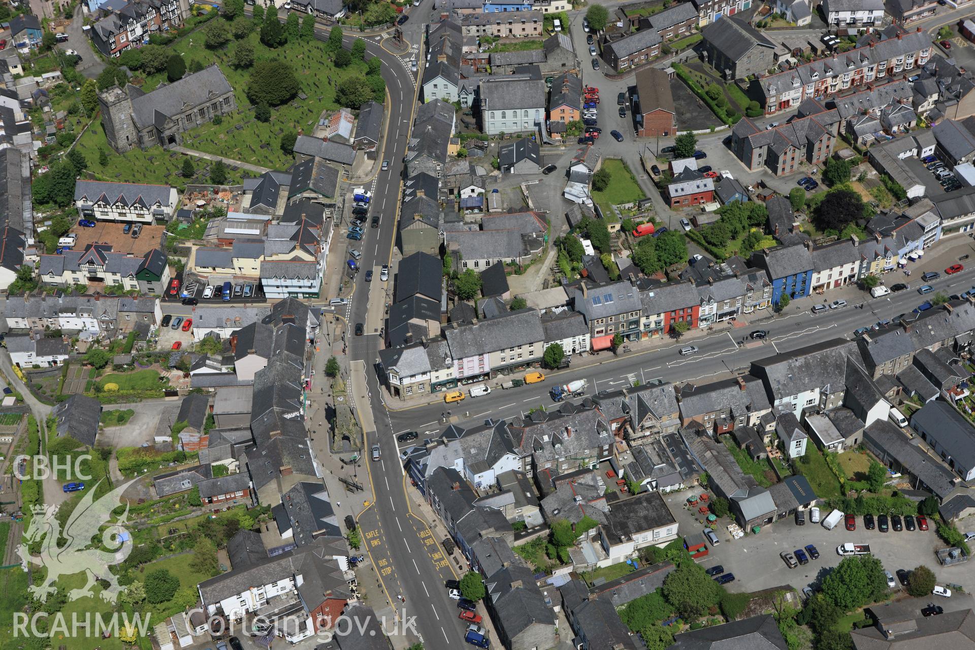 RCAHMW colour oblique aerial photograph of Machynlleth town. Taken on 02 June 2009 by Toby Driver