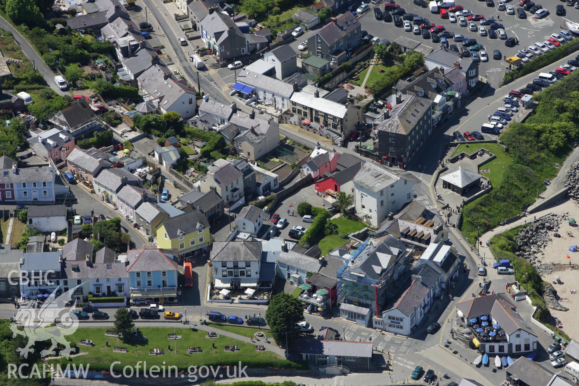 RCAHMW colour oblique aerial photograph of New Quay. Taken on 01 June 2009 by Toby Driver