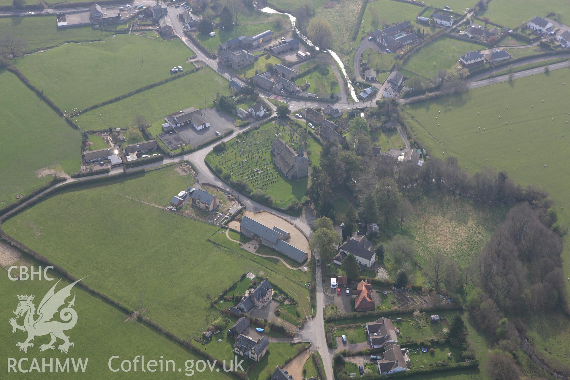 RCAHMW colour oblique aerial photograph of St Mary's in Gladestry Village. Taken on 21 April 2009 by Toby Driver