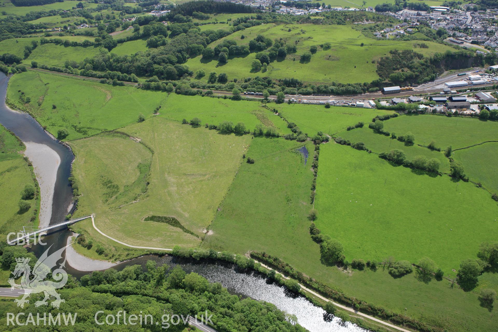 RCAHMW colour oblique aerial photograph of Dyfi Valley Embankment, Machynlleth. Taken on 02 June 2009 by Toby Driver
