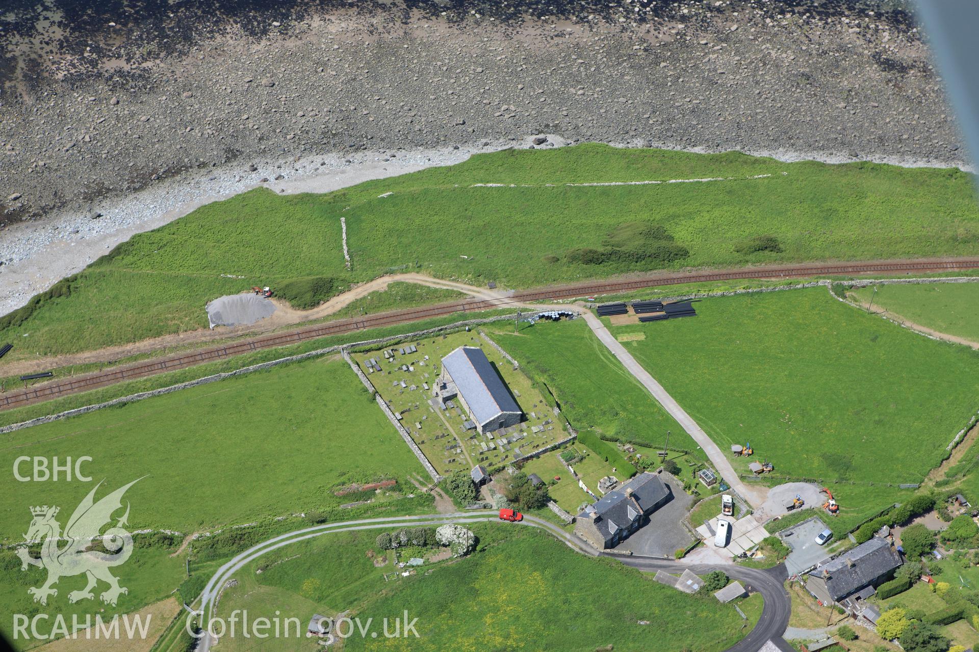 RCAHMW colour oblique aerial photograph of St Celynin's Church, Llangelynin. Taken on 02 June 2009 by Toby Driver
