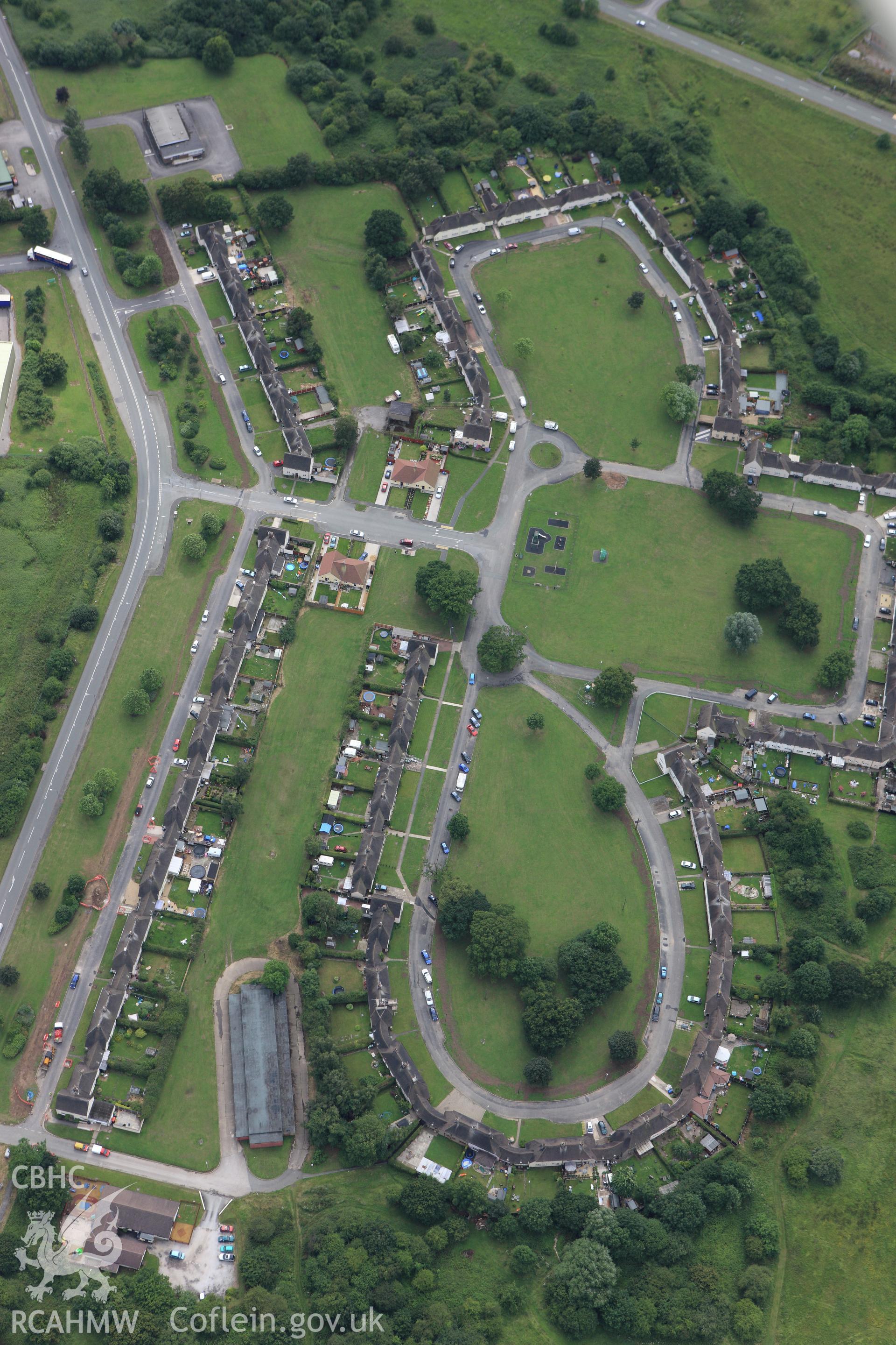 RCAHMW colour oblique aerial photograph of Pentre Maelor Housing Estate. Taken on 08 July 2009 by Toby Driver