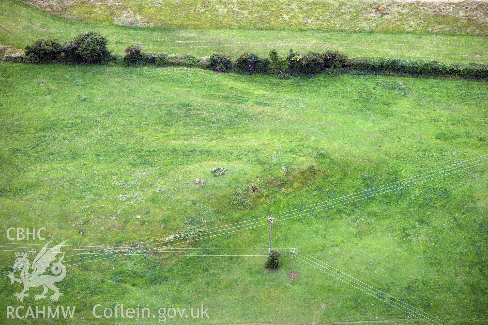 RCAHMW colour oblique aerial photograph of Heston Brake Chambered Tomb. Taken on 09 July 2009 by Toby Driver