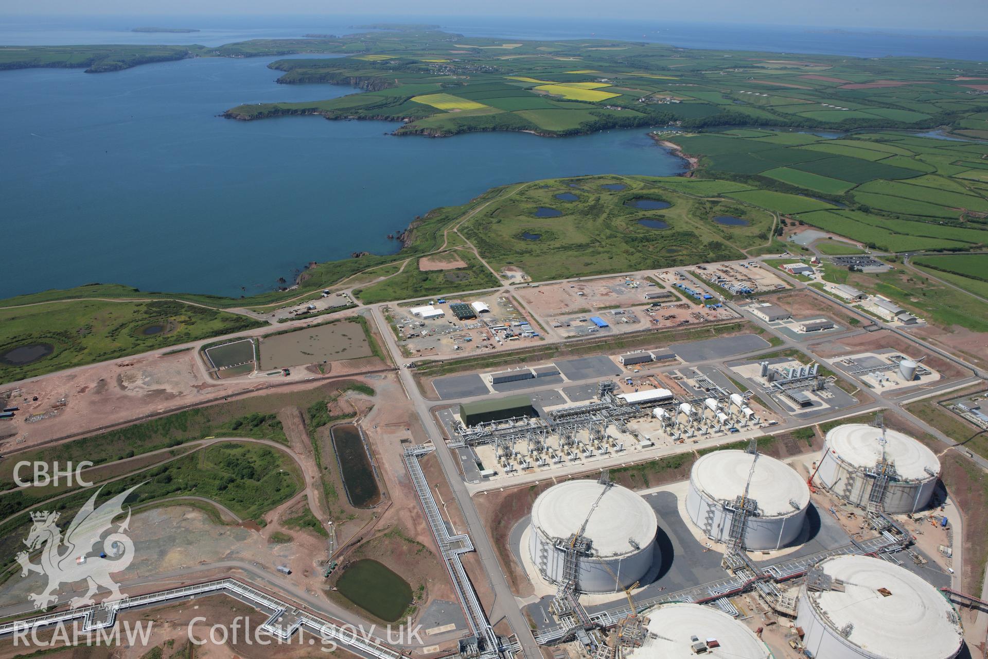 RCAHMW colour oblique aerial photograph of Esso South Hook Oil Refinery and liquid natural gas facility, Milford Haven. Taken on 01 June 2009 by Toby Driver