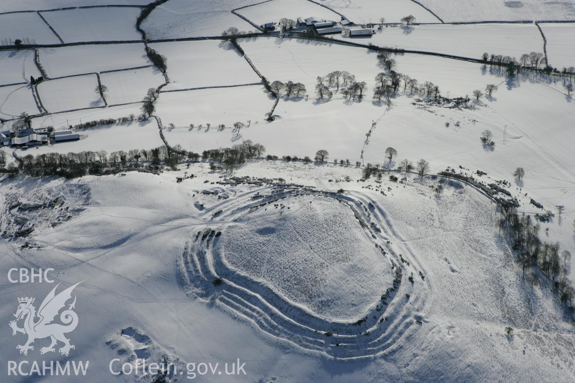 RCAHMW colour oblique photograph of Pen y Crug hillfort. Taken by Toby Driver on 06/02/2009.