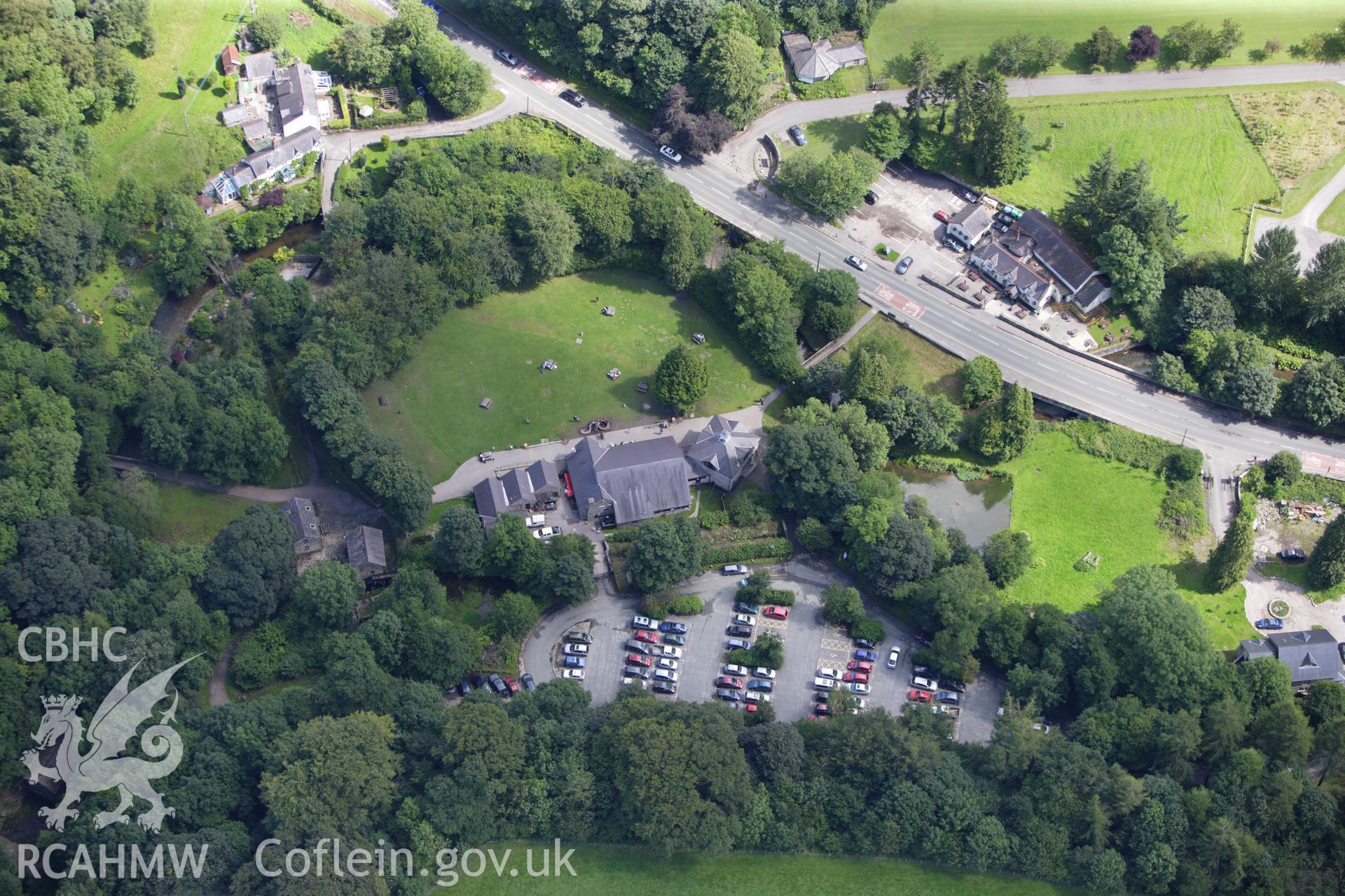 RCAHMW colour oblique aerial photograph of Loggerheads Country Park Visitor Centre. Taken on 30 July 2009 by Toby Driver