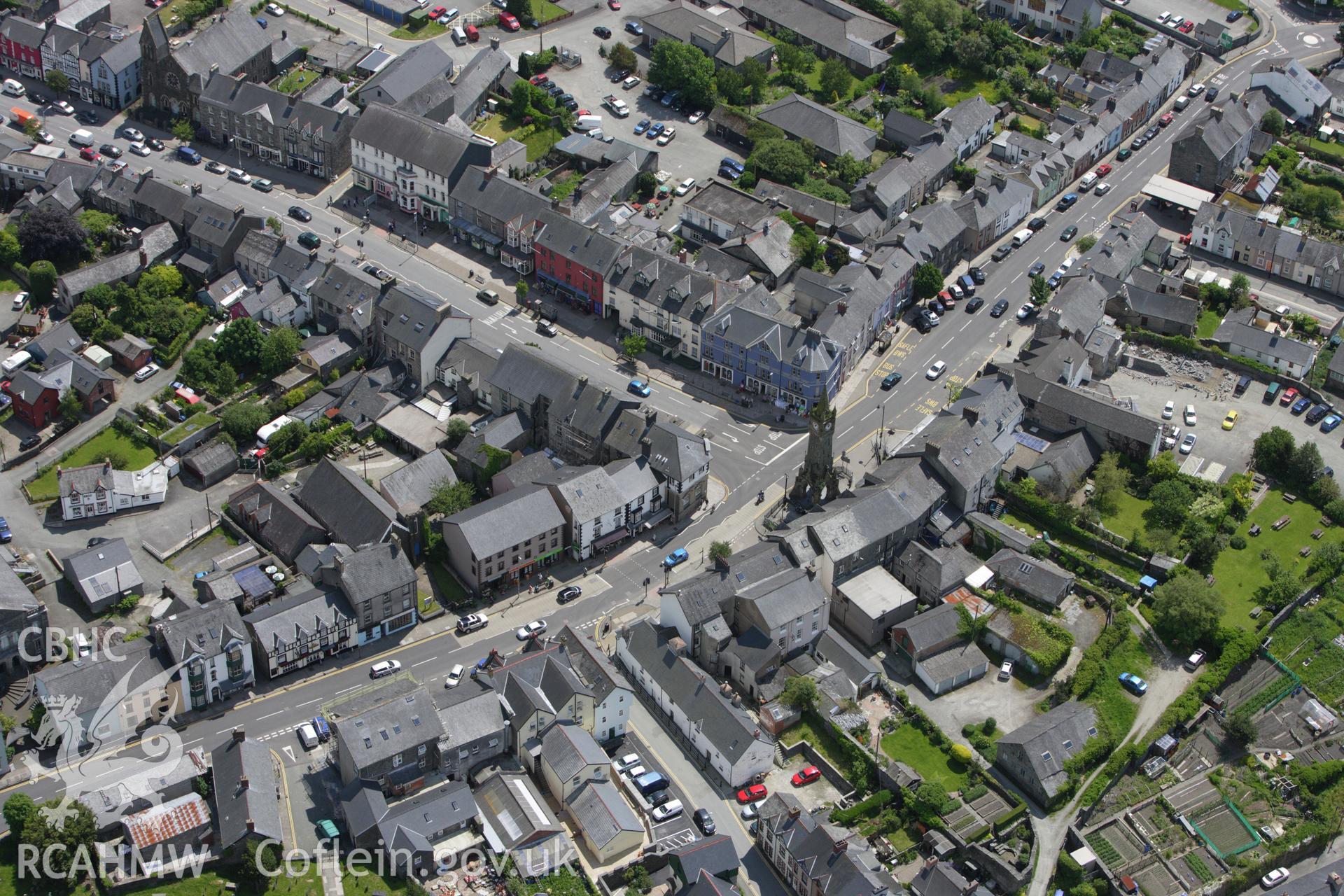 RCAHMW colour oblique aerial photograph of Machynlleth town. Taken on 02 June 2009 by Toby Driver