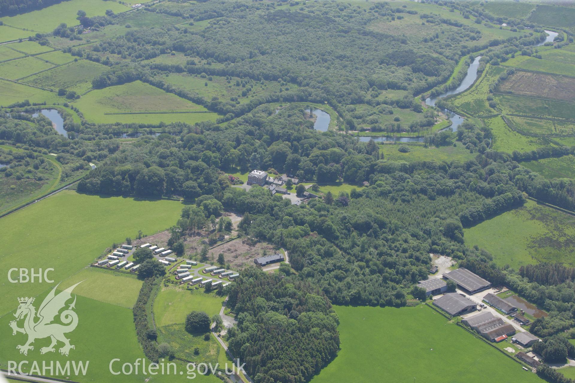 RCAHMW colour oblique aerial photograph of Peniarth Country House, in landscape view. Taken on 02 June 2009 by Toby Driver
