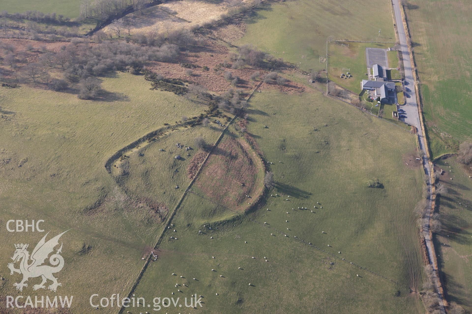 RCAHMW colour oblique photograph of Cefn Ddwysarn camp,. Taken by Toby Driver on 18/03/2009.