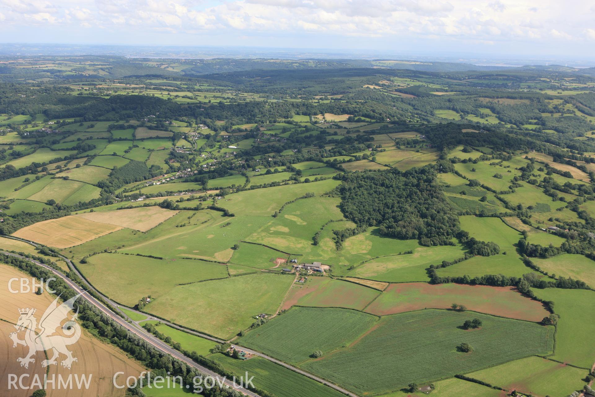 RCAHMW colour oblique aerial photograph of the site of a battle at Craig-y-Dorth, near Monmouth, from the north. Taken on 23 July 2009 by Toby Driver