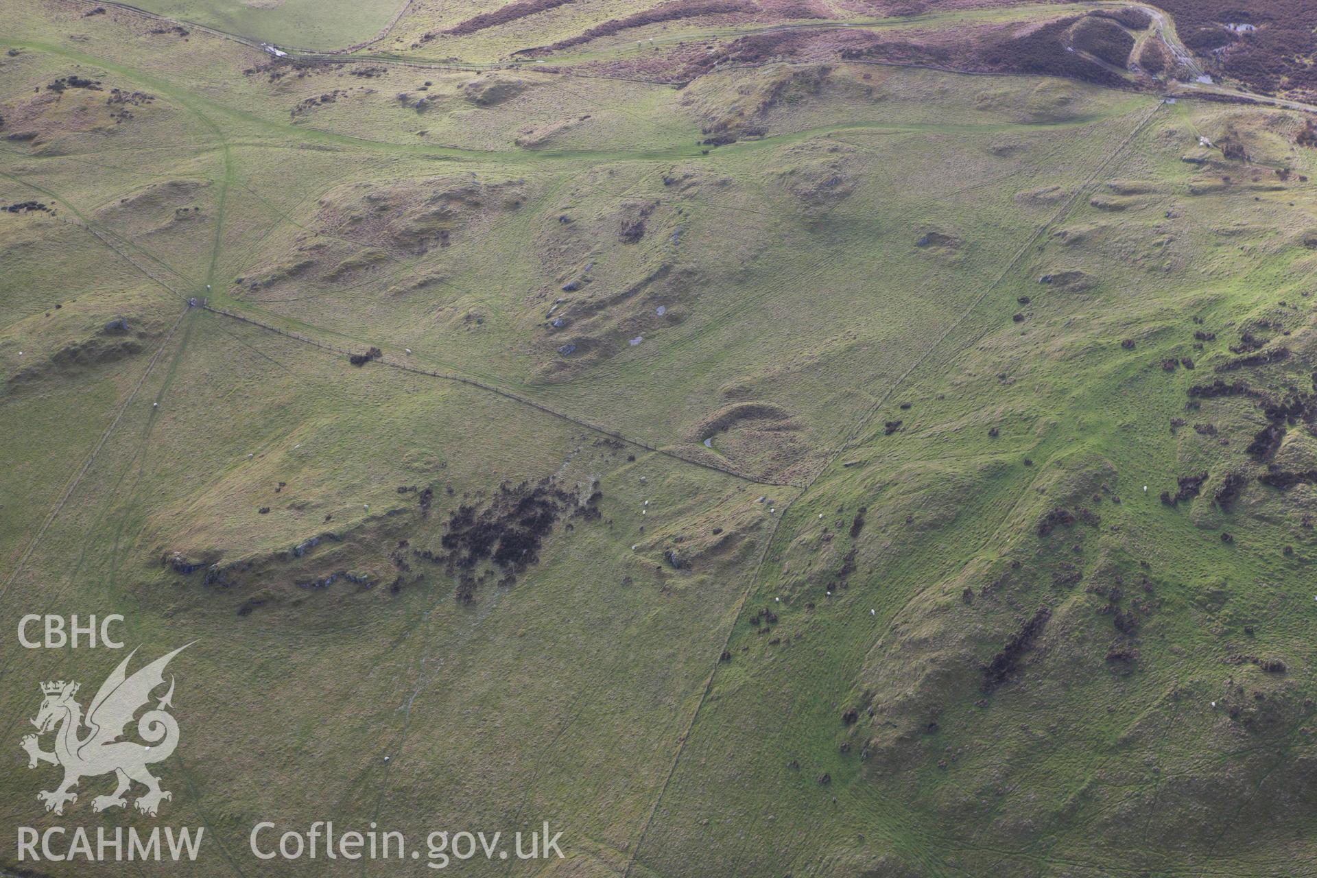RCAHMW colour oblique aerial photograph of Cefn Goleu Enclosure I. Taken on 10 December 2009 by Toby Driver