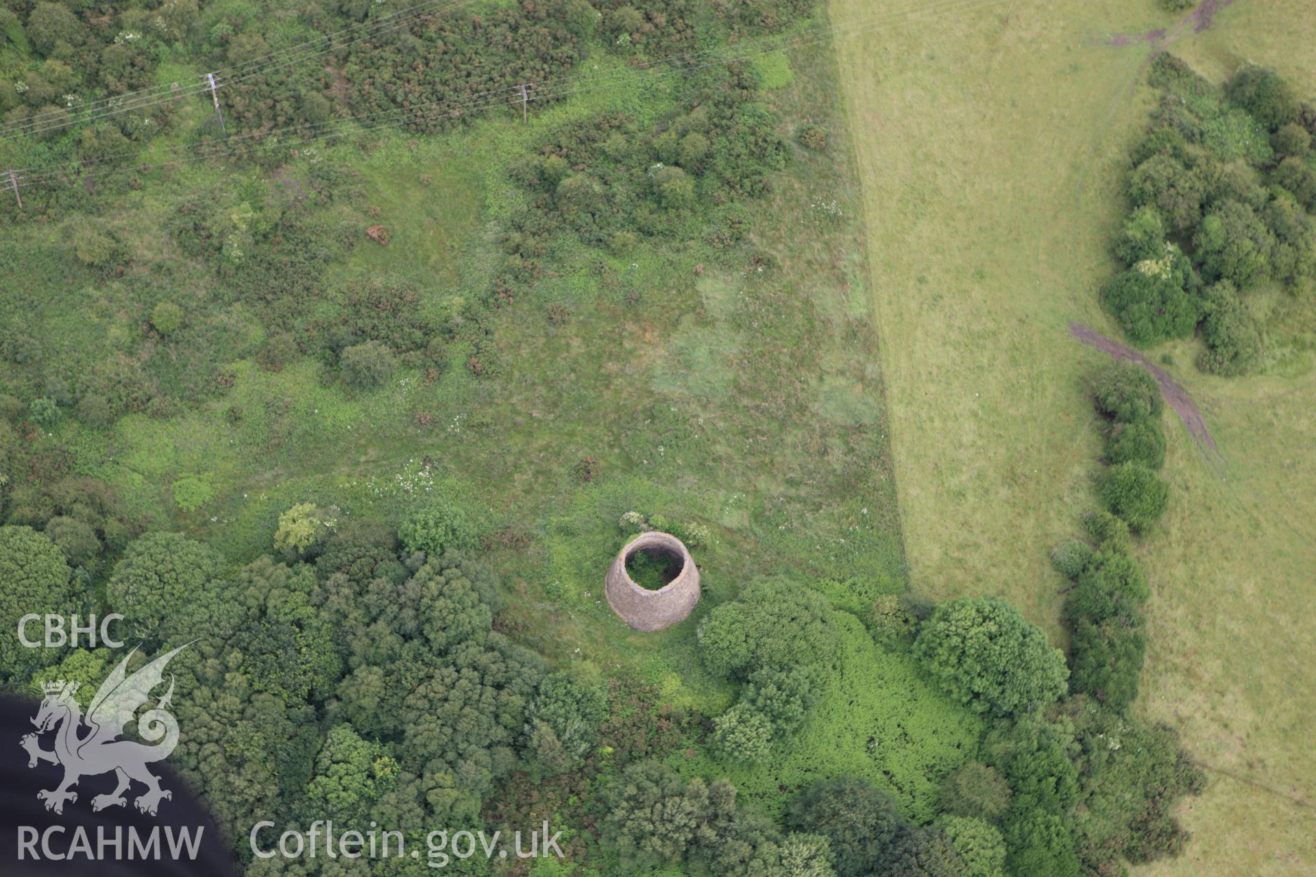 RCAHMW colour oblique aerial photograph of Brymbo lead smelting works Taken on 08 July 2009 by Toby Driver