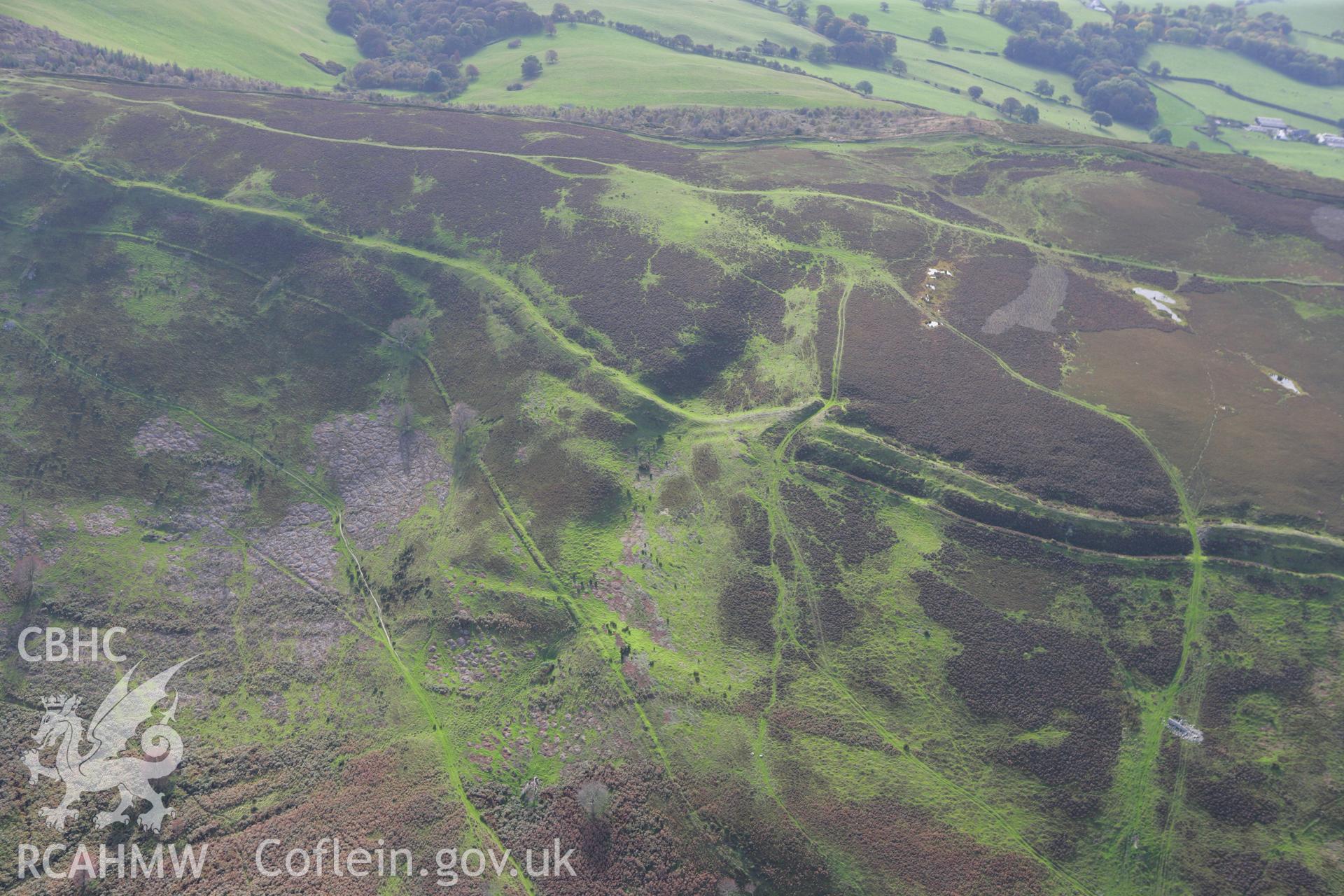 RCAHMW colour oblique aerial photograph of Penycloddiau Hillfort. Taken on 13 October 2009 by Toby Driver