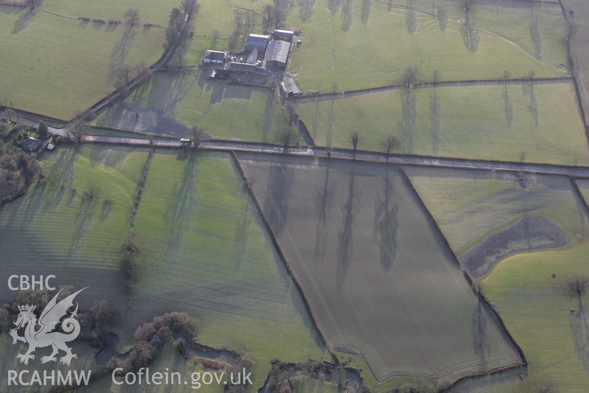 RCAHMW colour oblique photograph of earthworks and pond, south-west of Domen Castell. Taken by Toby Driver on 21/01/2009.