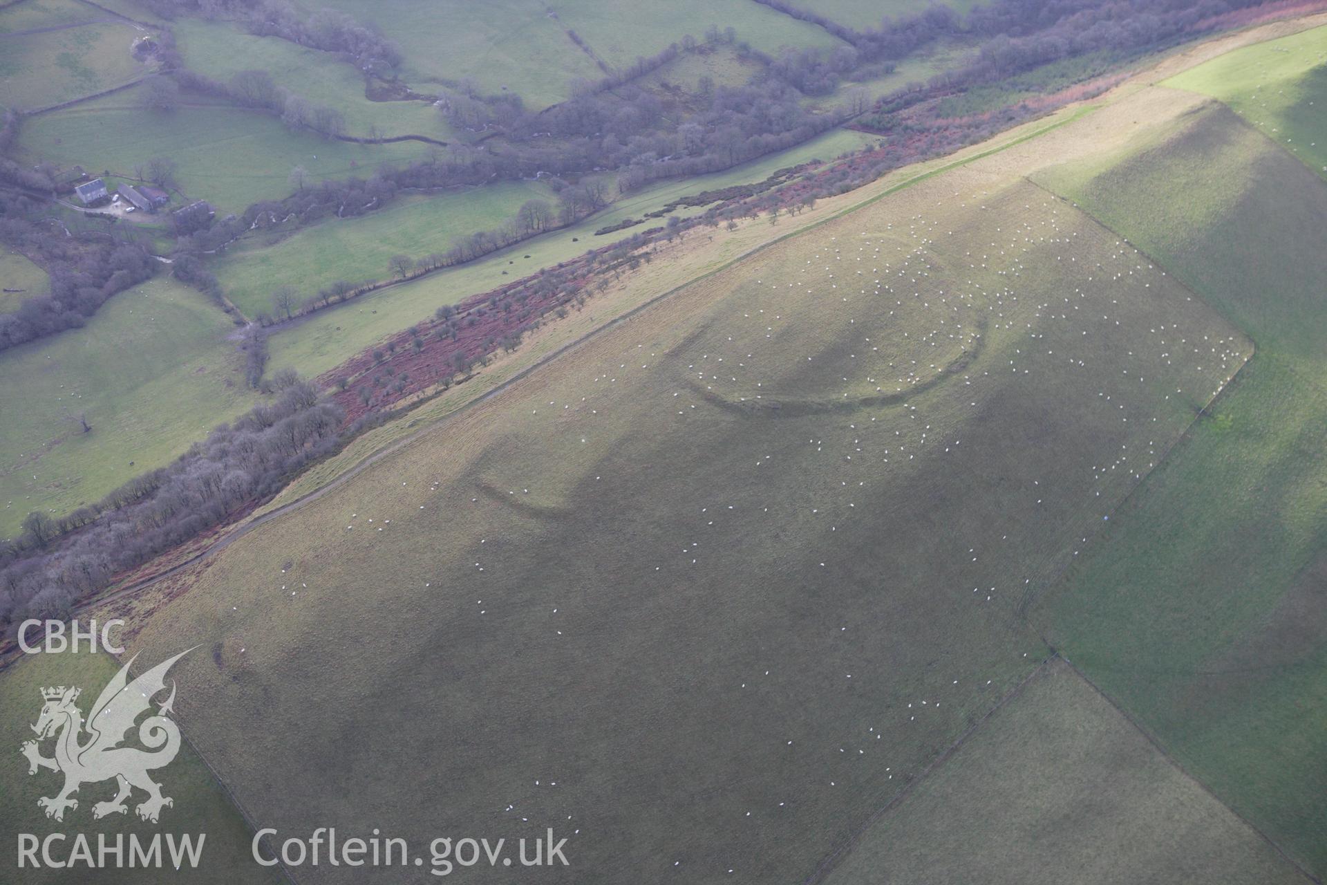 RCAHMW colour oblique aerial photograph of Llyssin Hill Hillfort and Crossdykes. Taken on 10 December 2009 by Toby Driver