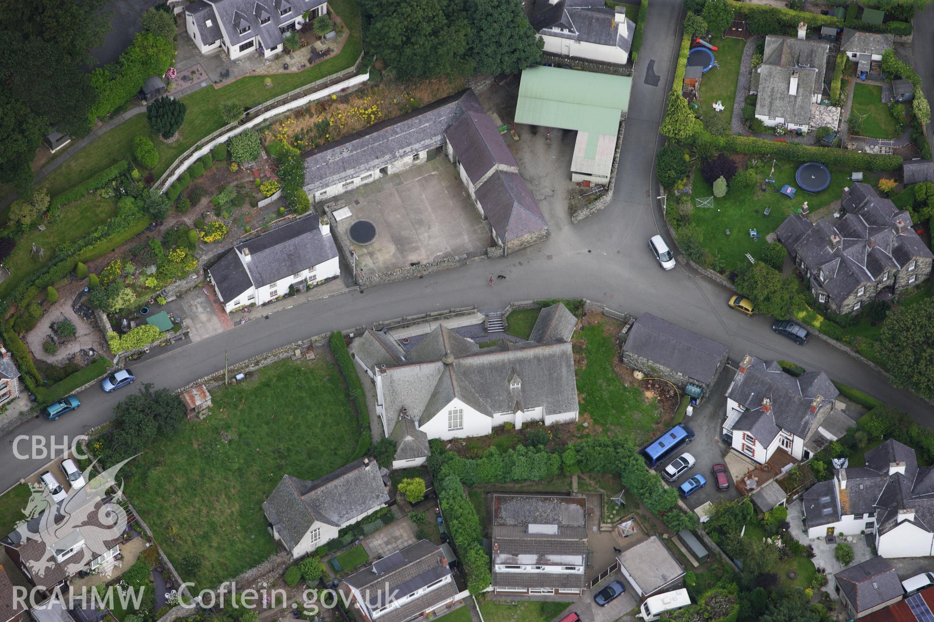 RCAHMW colour oblique aerial photograph of Church Institute, Park Road, Llanfairfechan. Taken on 06 August 2009 by Toby Driver
