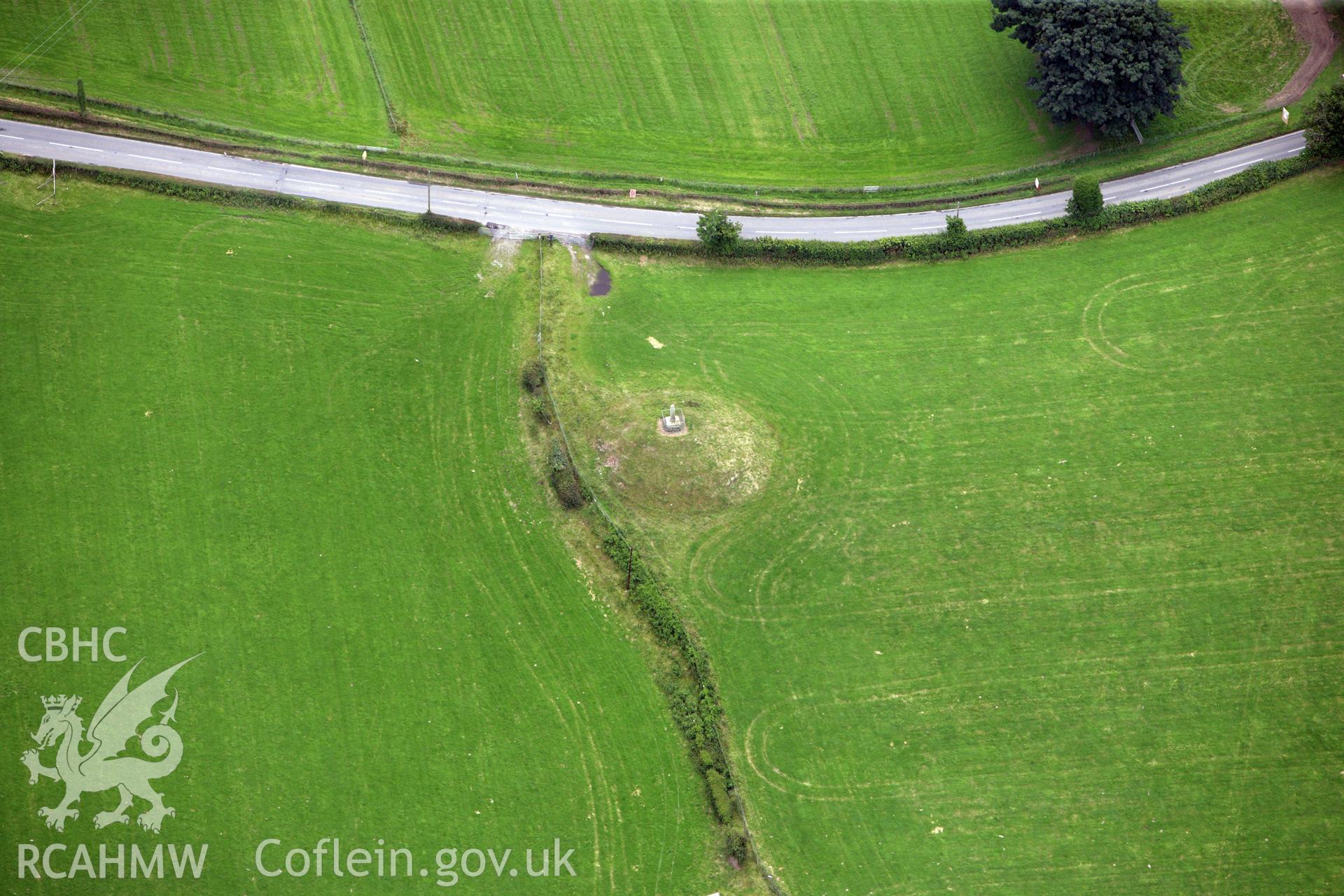 RCAHMW colour oblique aerial photograph of Eliseg's Pillar, Cross and Burial Mound, near Llangollen. Taken on 08 July 2009 by Toby Driver