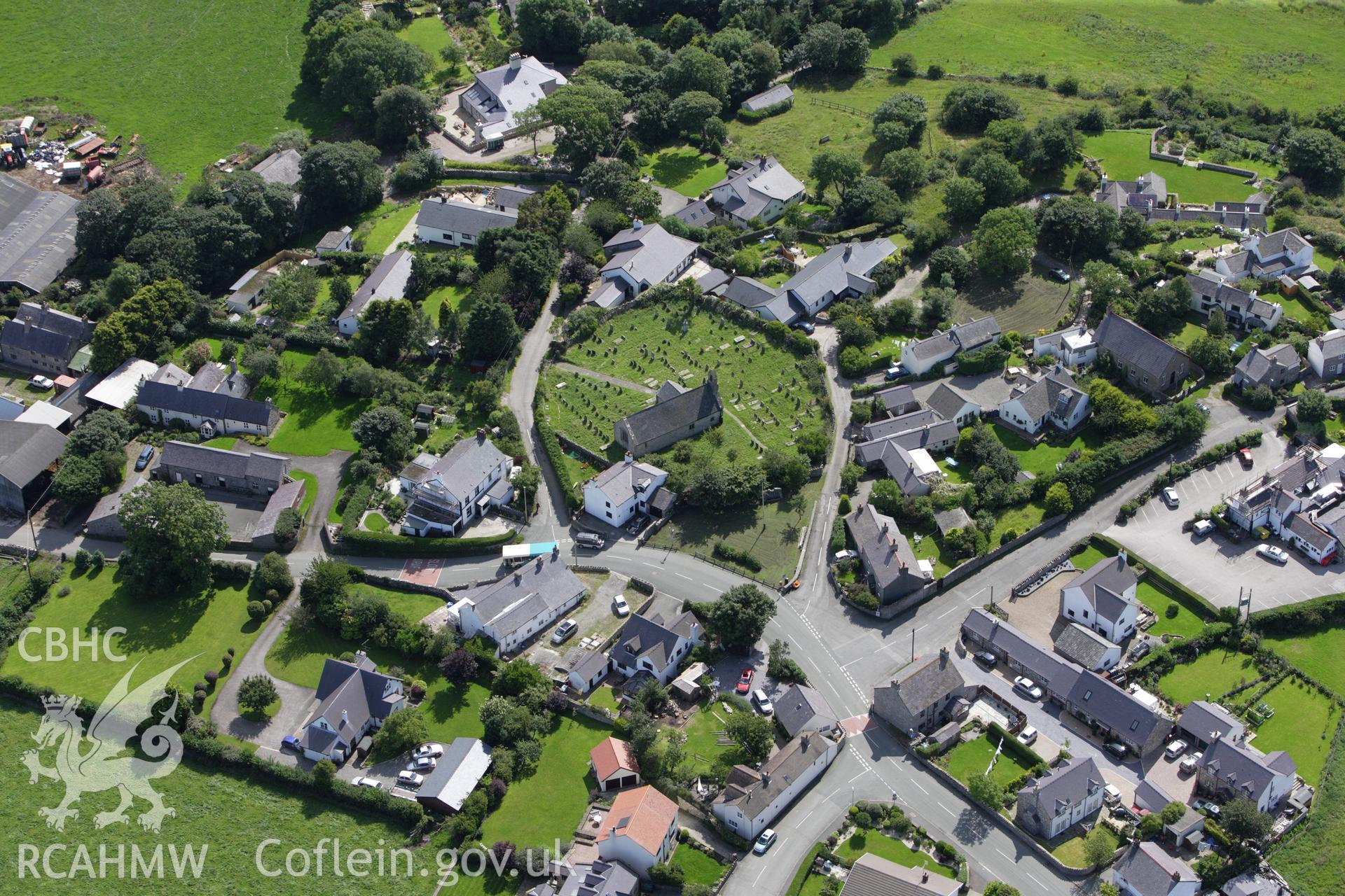 RCAHMW colour oblique aerial photograph of St Mary Magdalene's Church, Gwaenysgor, and the village. Taken on 30 July 2009 by Toby Driver