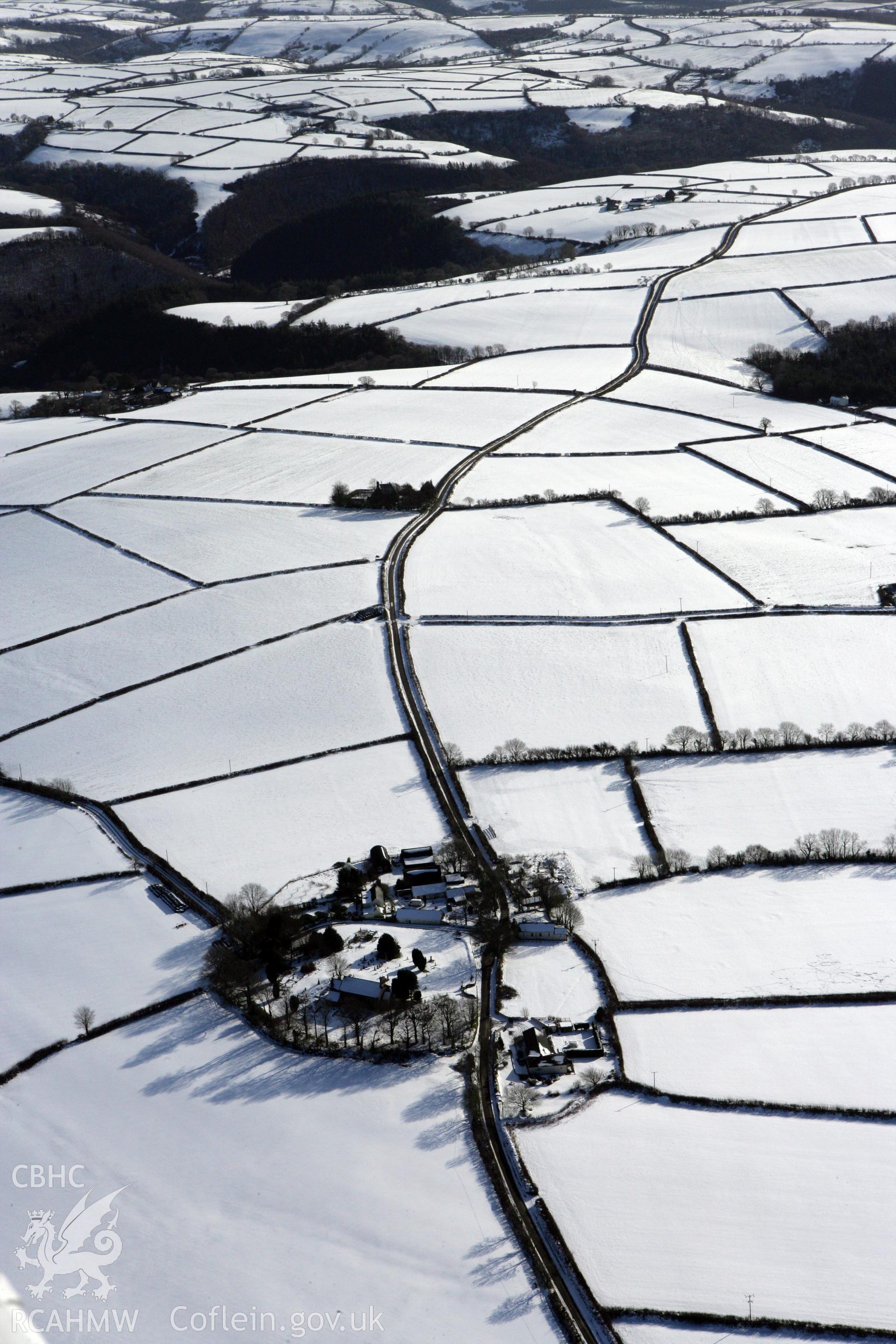 RCAHMW colour oblique photograph of Llanwinio Church, winter landscape. Taken by Toby Driver on 06/02/2009.