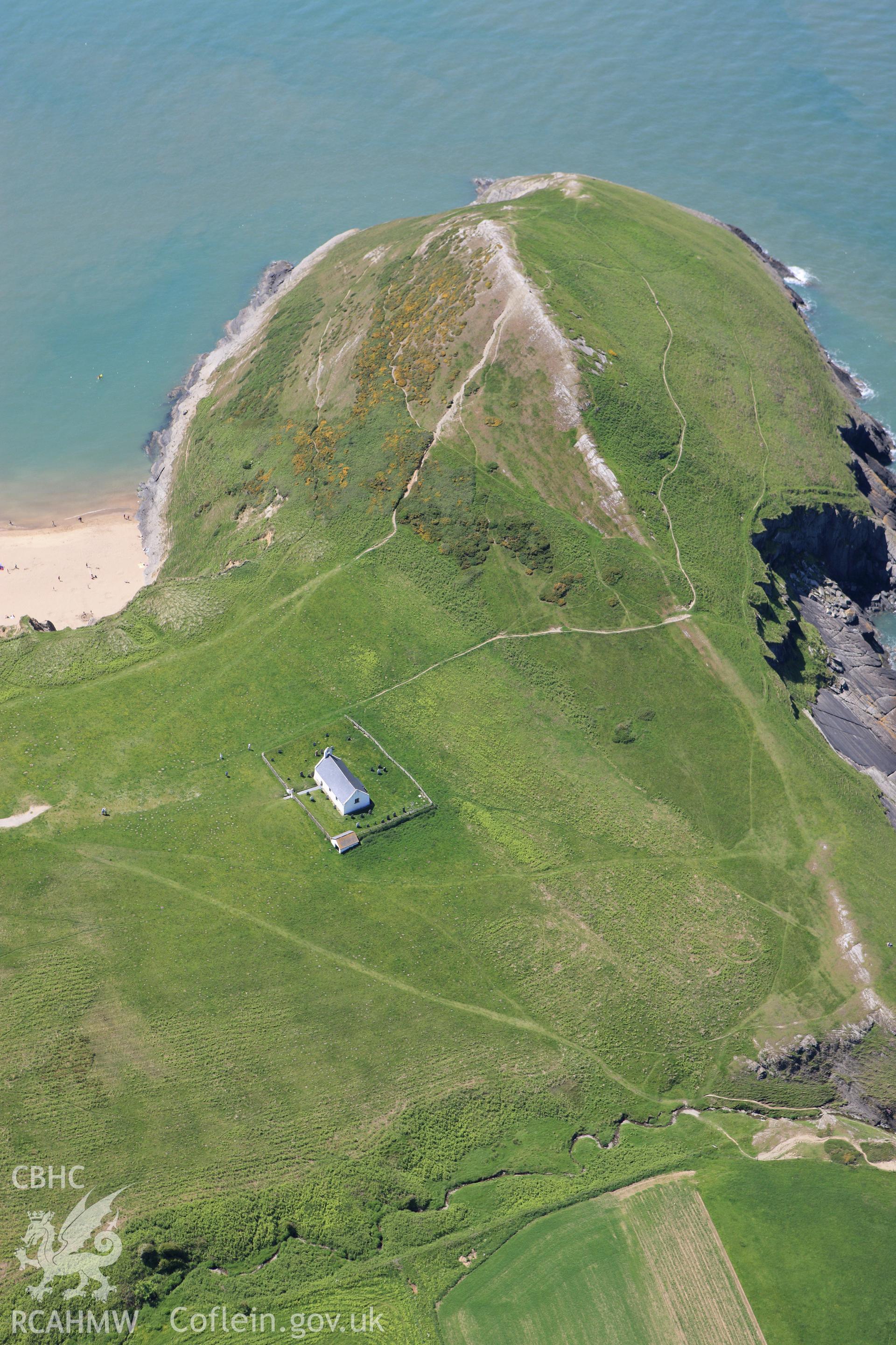 RCAHMW colour oblique aerial photograph of Holy Cross Church, Mwnt Verwig Taken on 01 June 2009 by Toby Driver