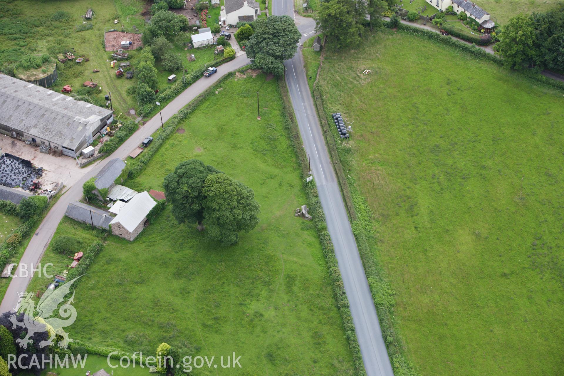 RCAHMW colour oblique aerial photograph of Gaerllwyd Burial Chamber. Taken on 09 July 2009 by Toby Driver