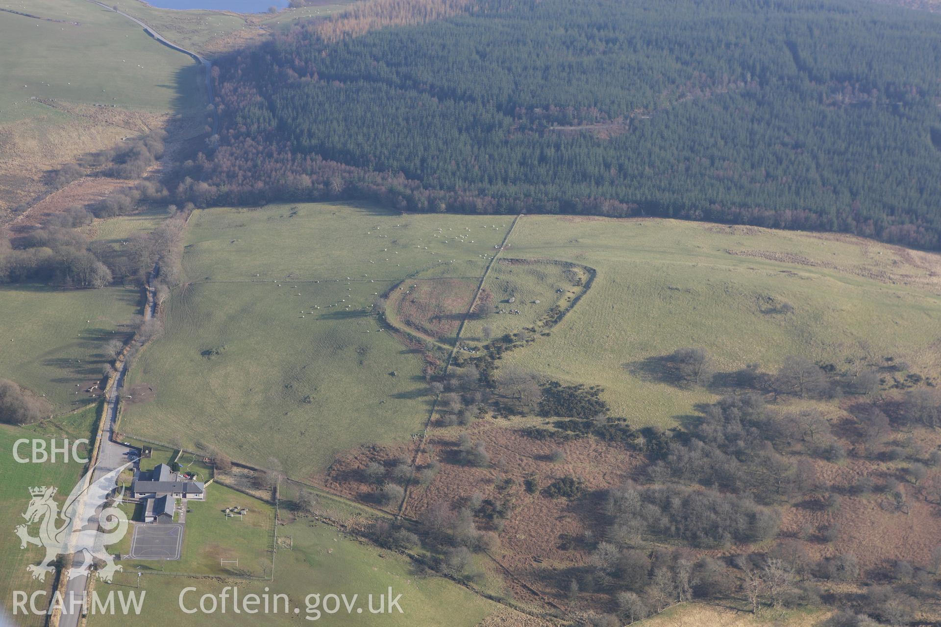 RCAHMW colour oblique photograph of Cefn Ddwysarn camp,. Taken by Toby Driver on 18/03/2009.
