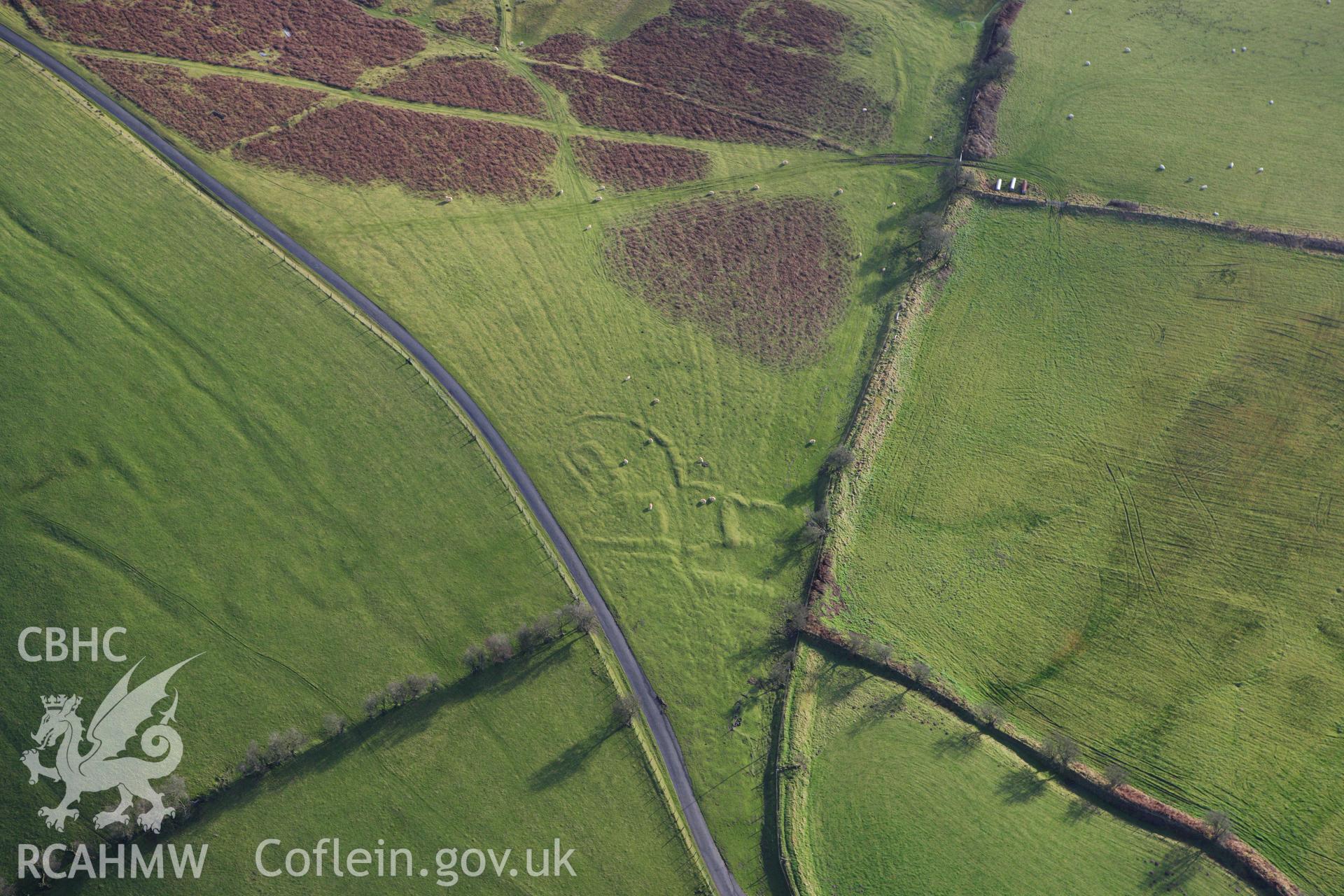 RCAHMW colour oblique aerial photograph of the western part of Fron Top Deserted Rural Settlement. Taken on 10 December 2009 by Toby Driver