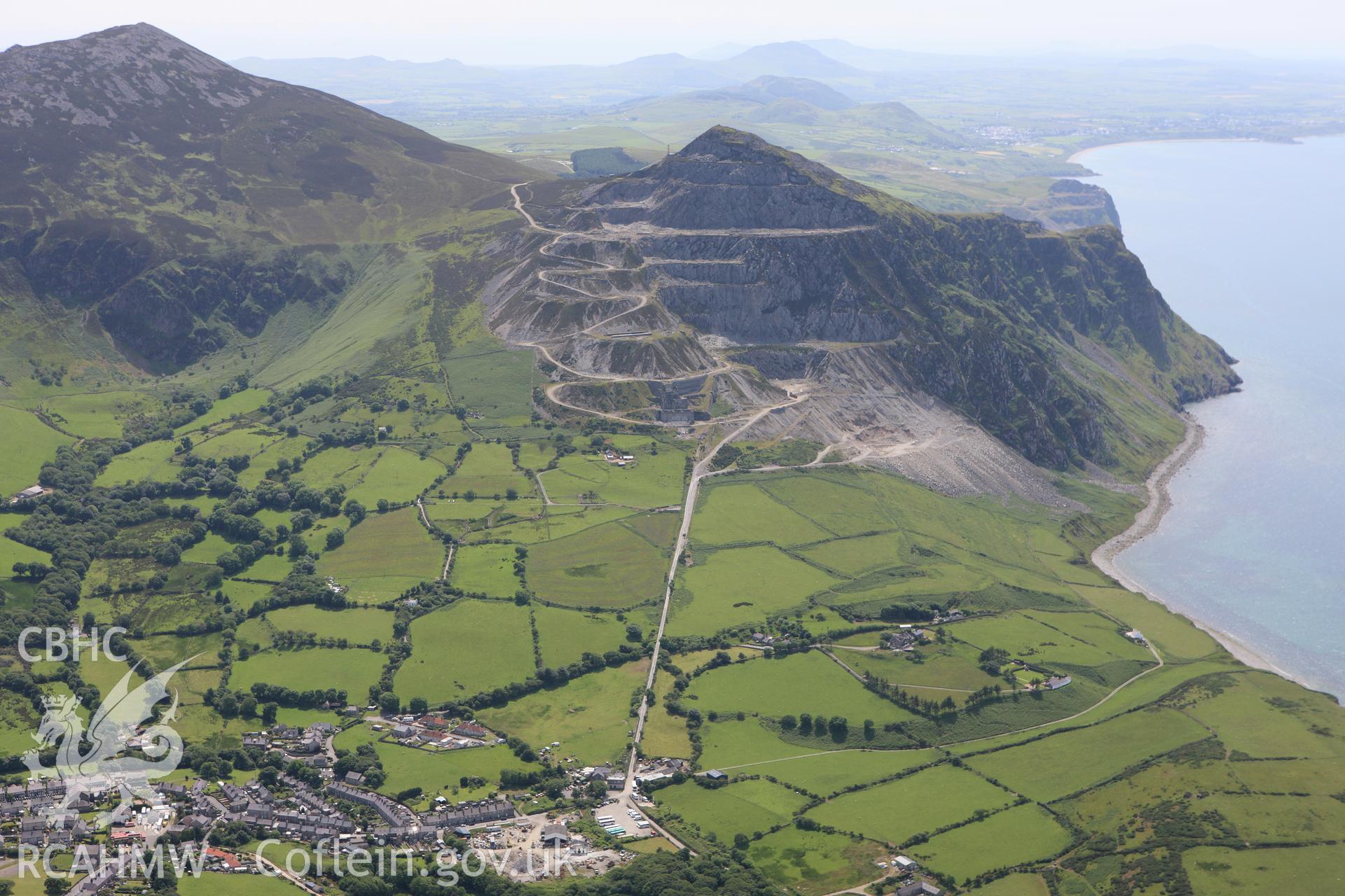 RCAHMW colour oblique aerial photograph of Yr Eifl Quarry. Taken on 16 June 2009 by Toby Driver