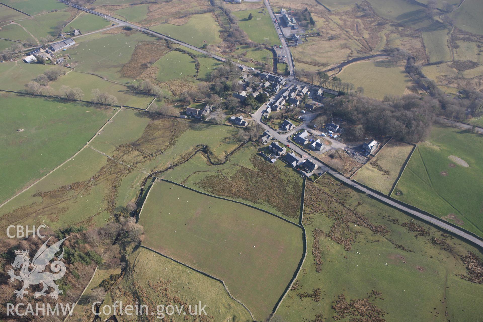 RCAHMW colour oblique photograph of Pentrefoelas, village. Taken by Toby Driver on 18/03/2009.