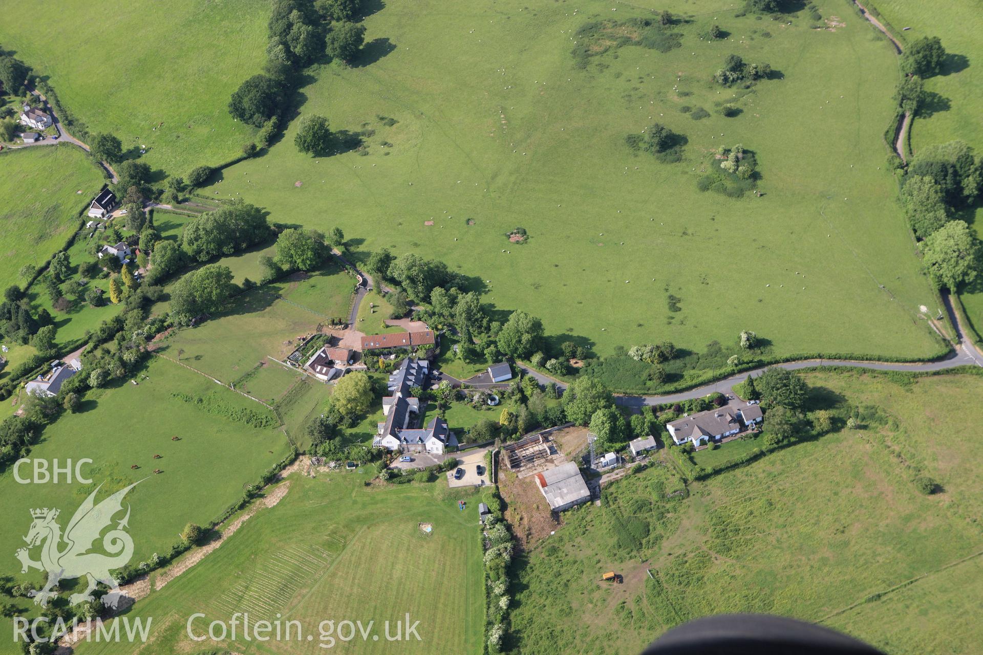 RCAHMW colour oblique aerial photograph of Talgarth Settlement Earthworks. Taken on 11 June 2009 by Toby Driver