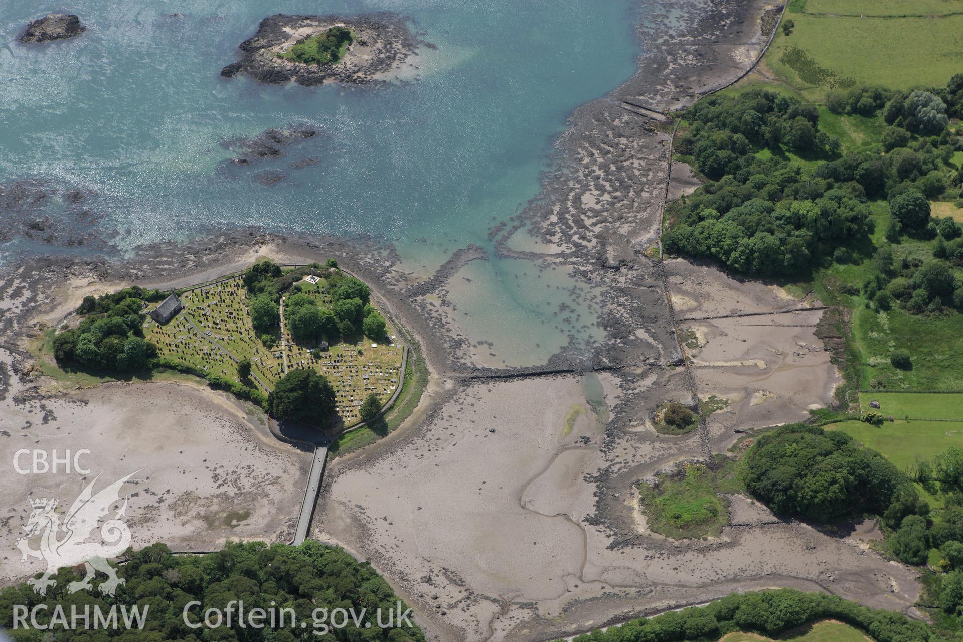 RCAHMW colour oblique aerial photograph of St Tysilio's Church. Taken on 16 June 2009 by Toby Driver