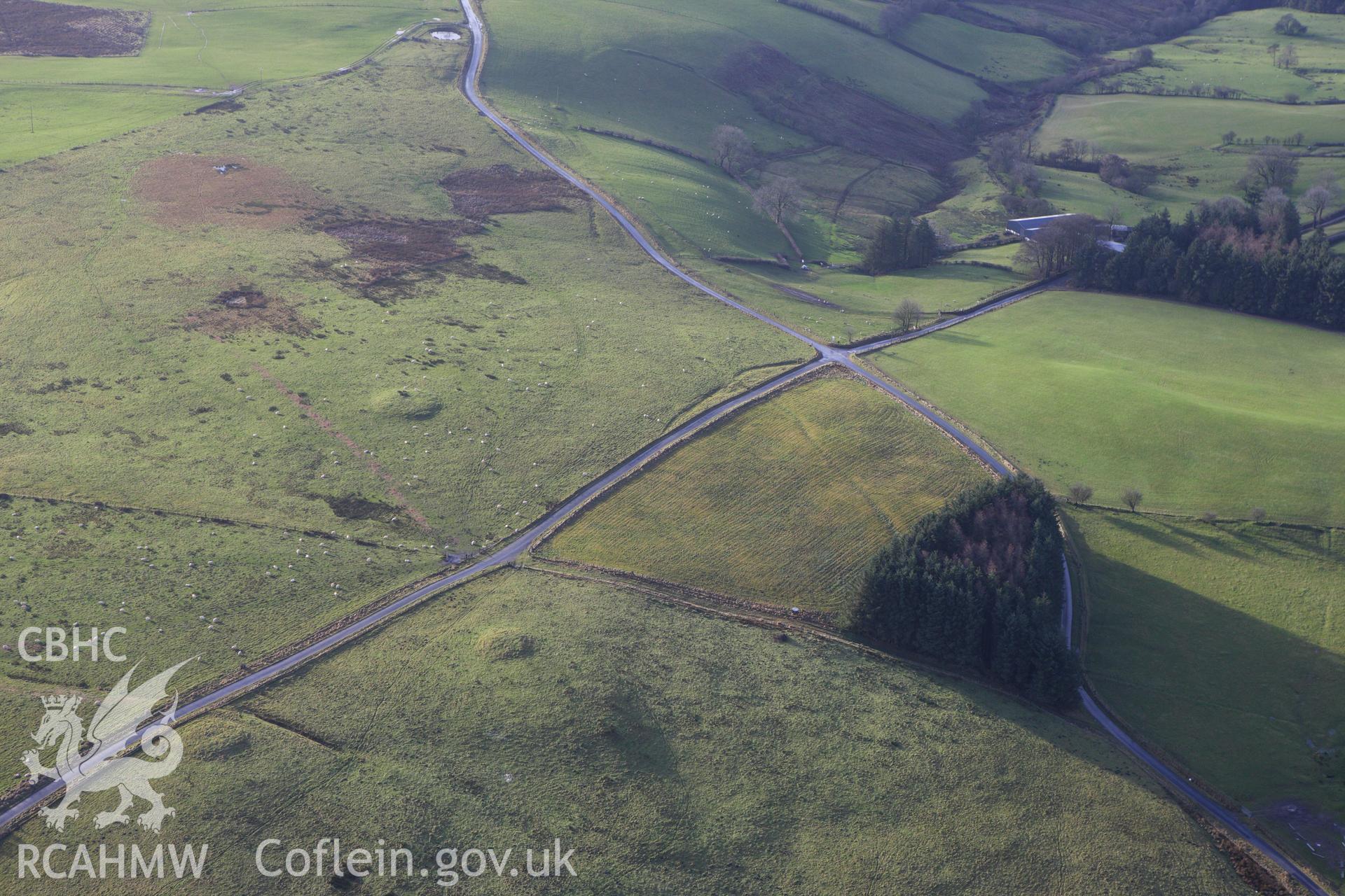 RCAHMW colour oblique aerial photograph of Rhiw Porthnant Barrow I. Taken on 10 December 2009 by Toby Driver